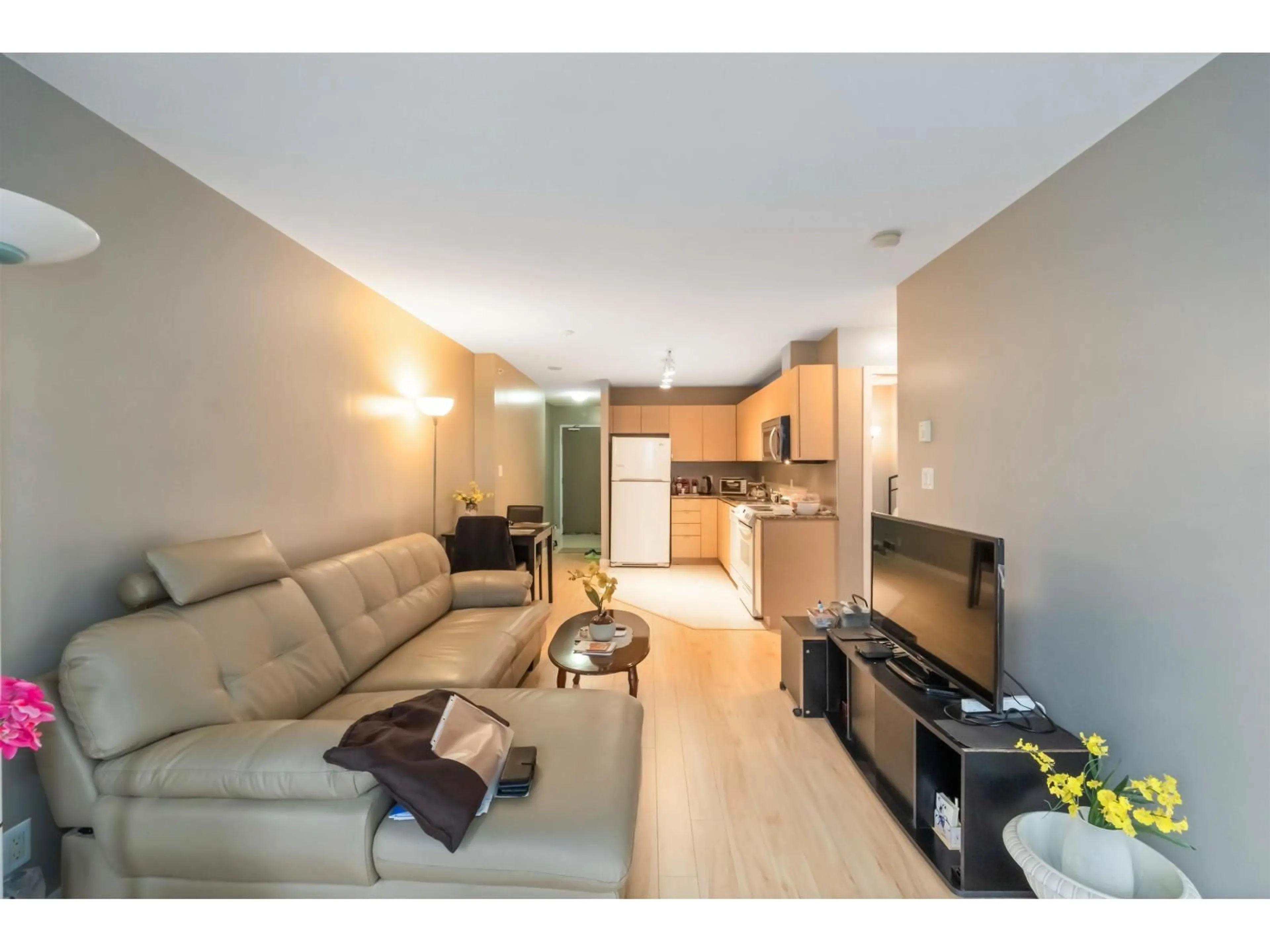 Living room with furniture, wood/laminate floor for 807 - 13618 100 AVENUE, Surrey British Columbia V3T0A8