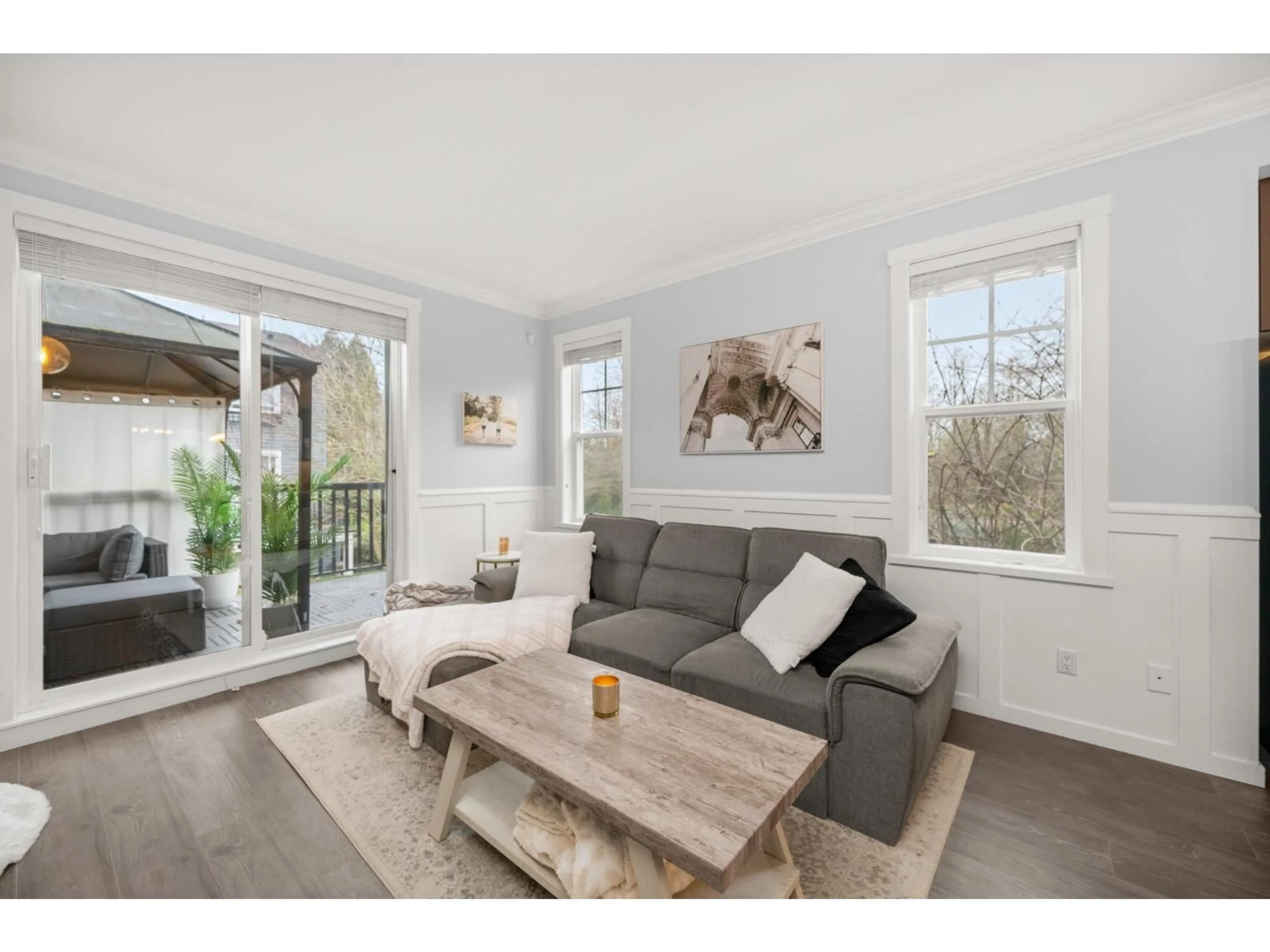 Living room with furniture, wood/laminate floor for 16 - 18983 72A AVENUE, Surrey British Columbia V4N1A5