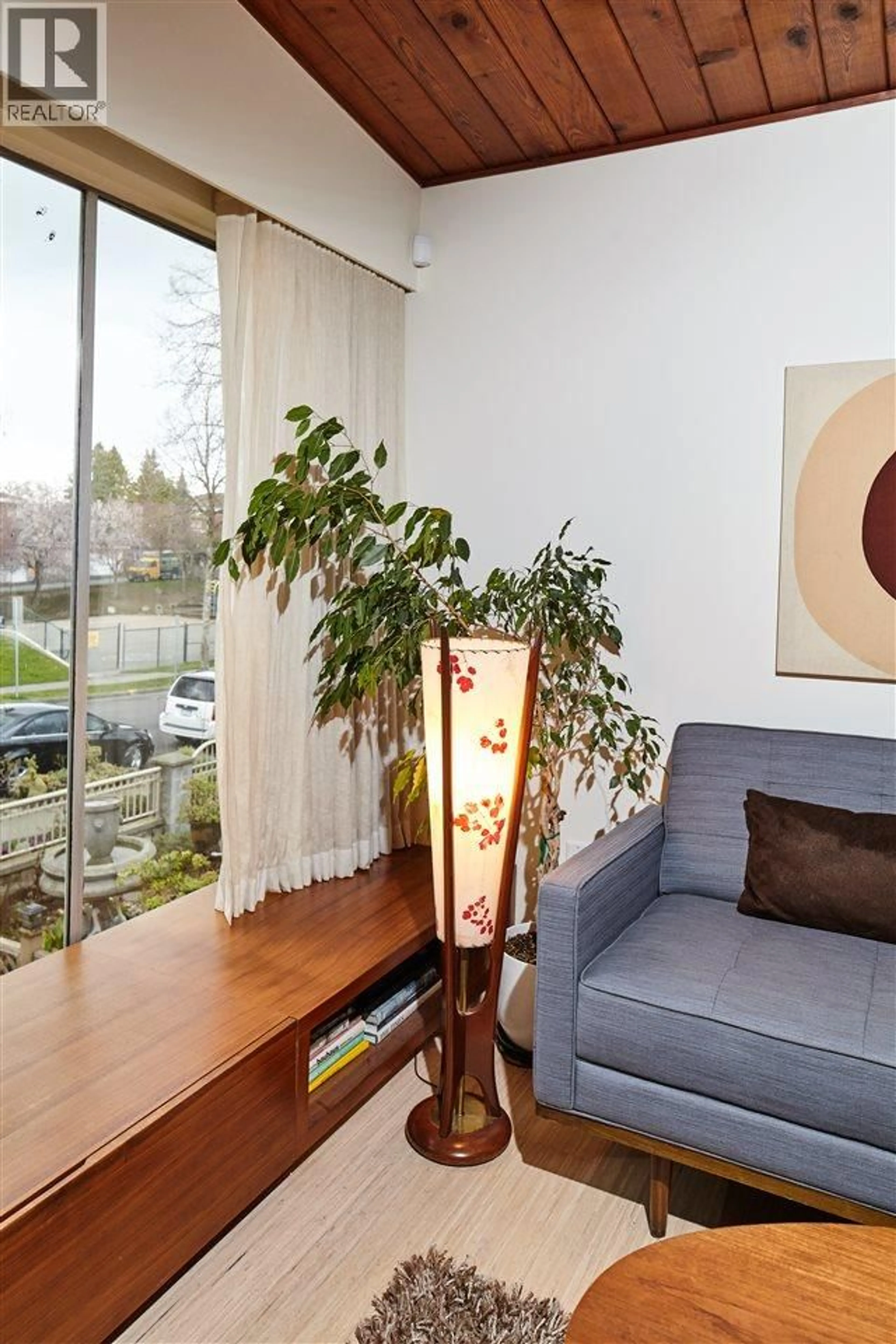 Living room with furniture, wood/laminate floor for 1518 37TH AVENUE, Vancouver British Columbia V5P1E3