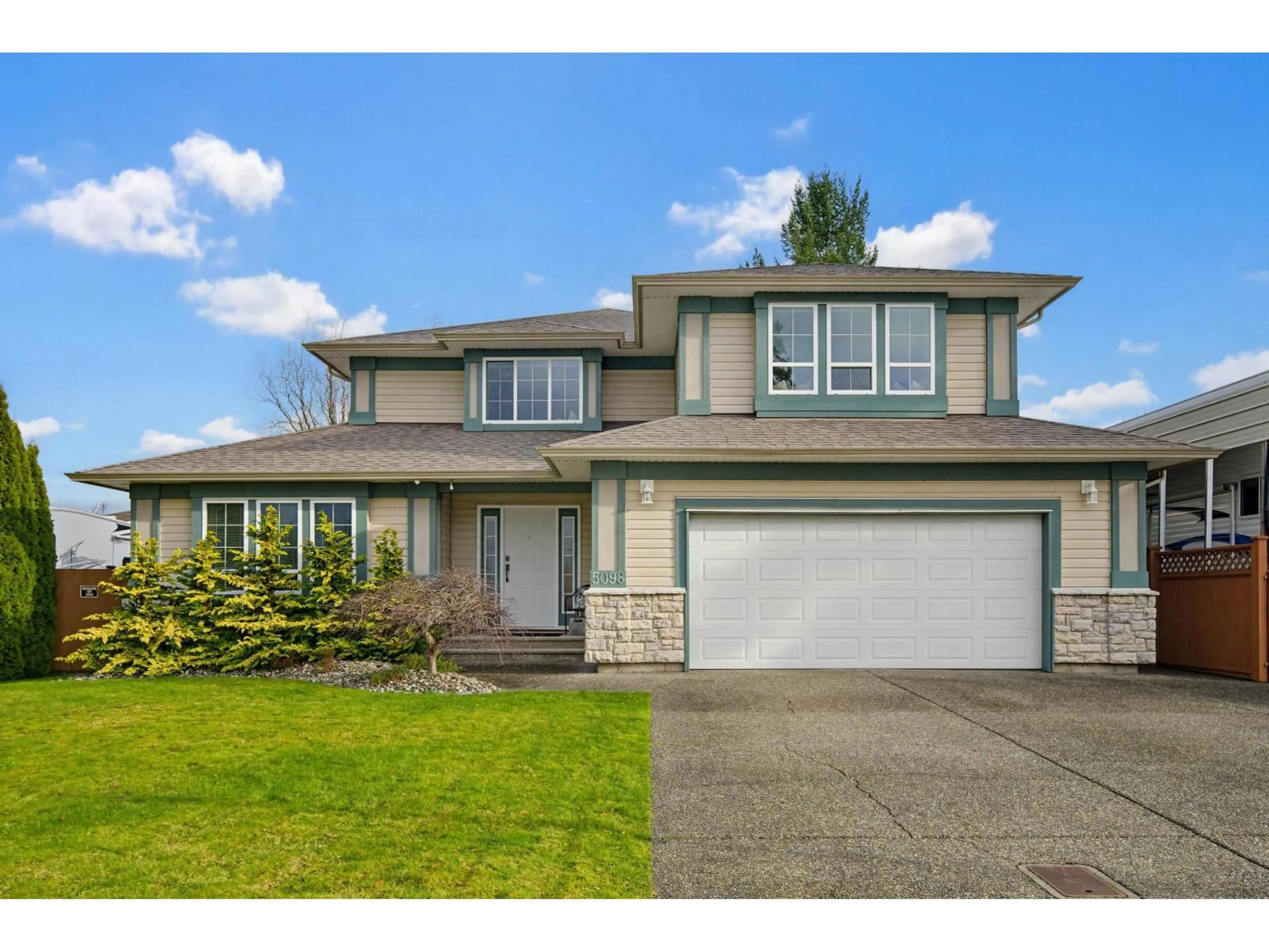 Home with vinyl exterior material, street for 5098 214 STREET, Langley British Columbia V3A5B7