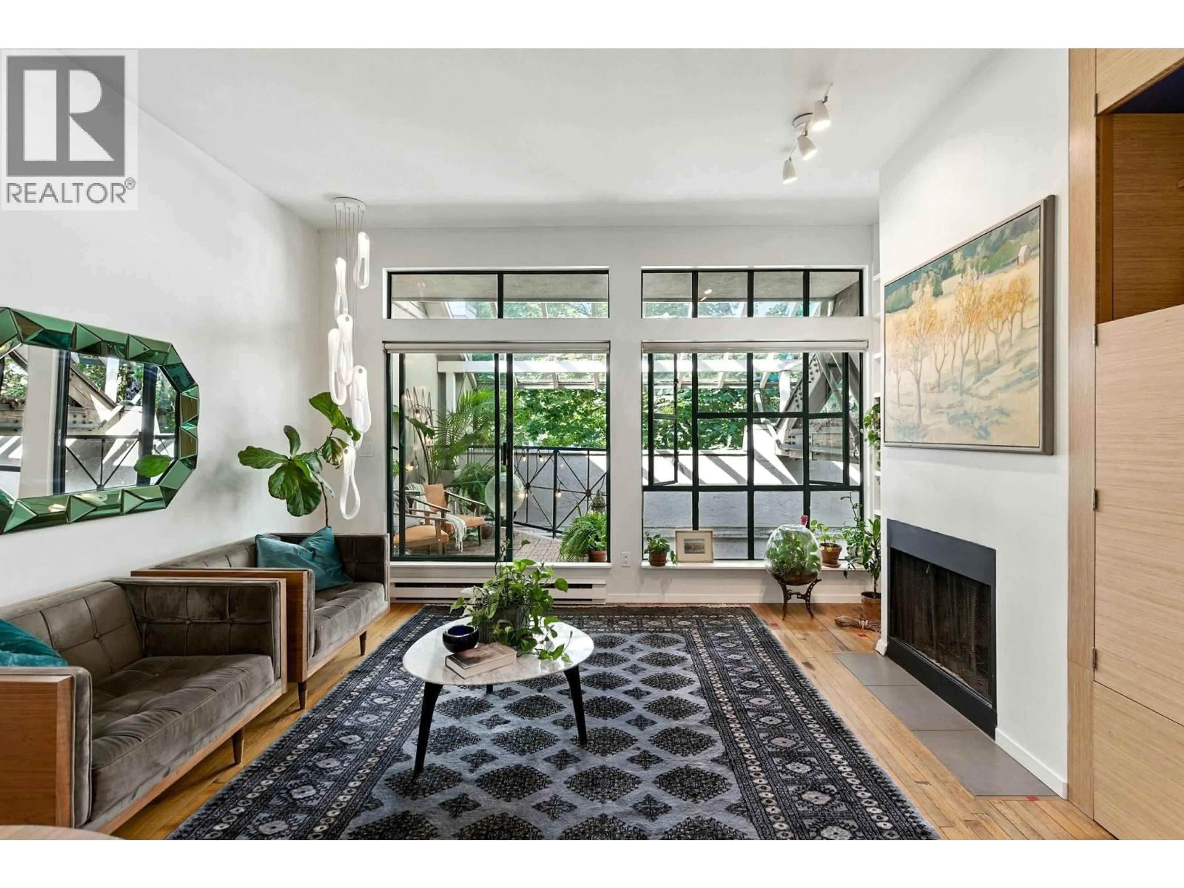 Living room with furniture, unknown for 303 - 700 PENDER STREET, Vancouver British Columbia V6A1V7