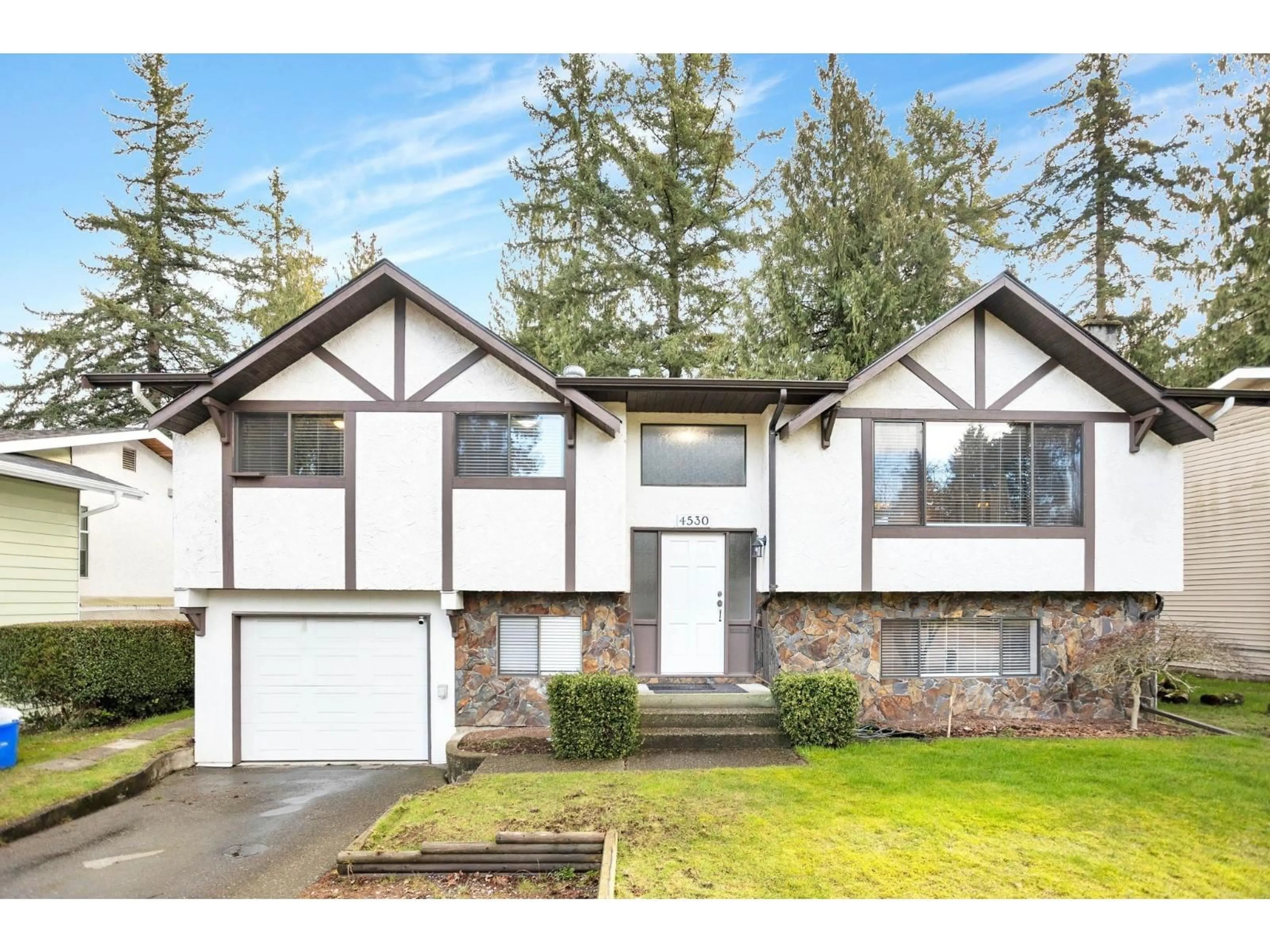 Home with vinyl exterior material, street for 4530 202 STREET, Langley British Columbia V3A6M7