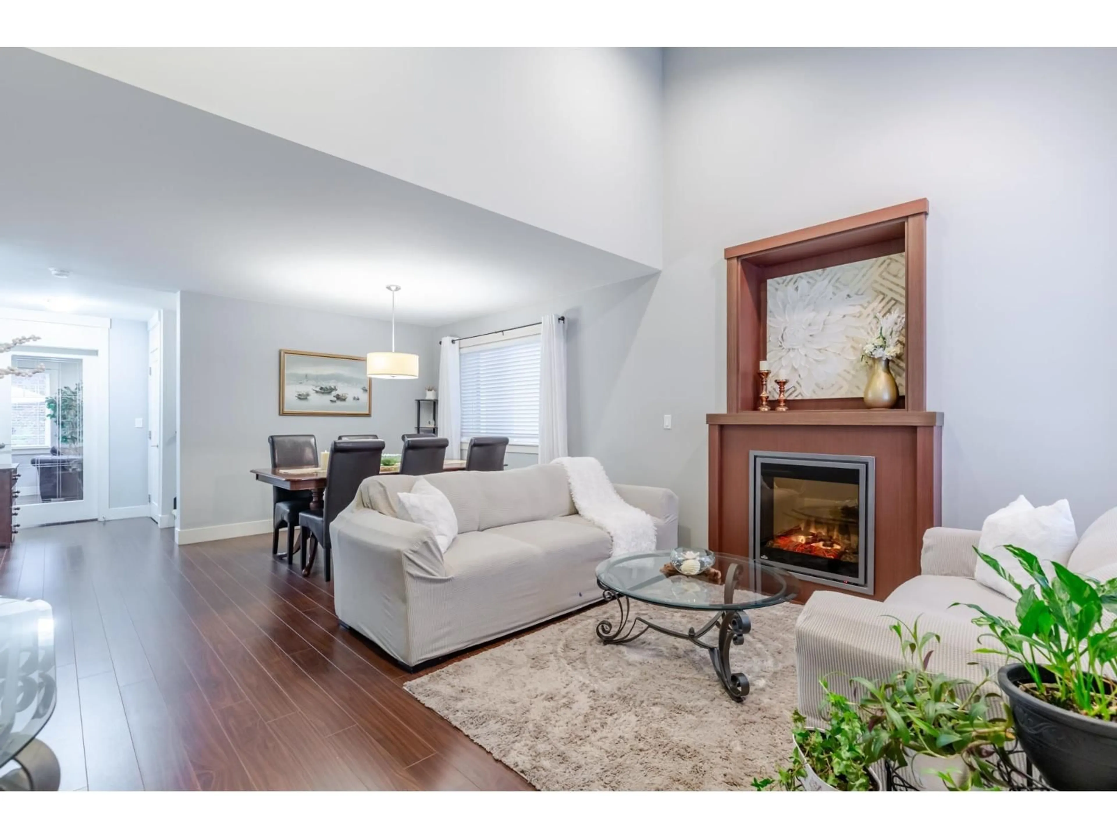 Living room with furniture, wood/laminate floor for 12 - 30748 CARDINAL AVENUE, Abbotsford British Columbia V2T0C1
