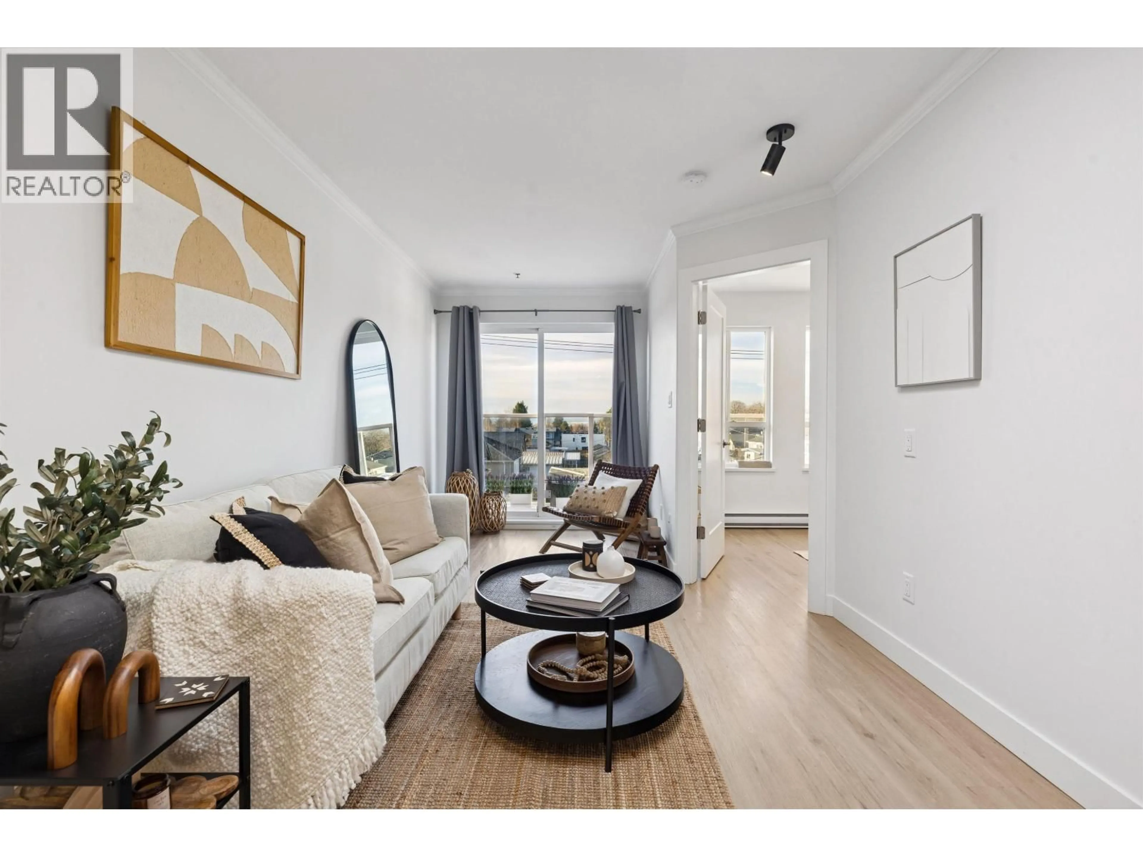 Living room with furniture, wood/laminate floor for PH5 - 1503 66TH AVENUE, Vancouver British Columbia V6P2R8