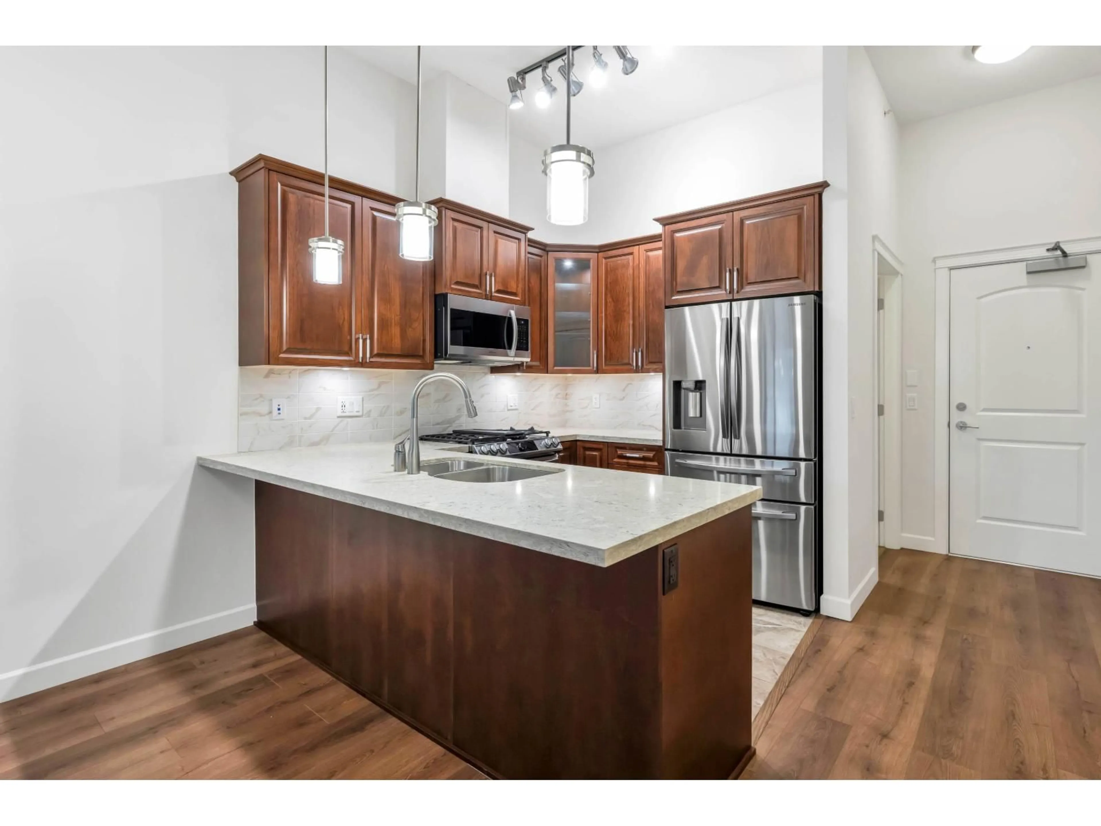 Standard kitchen, wood/laminate floor for 612 - 8538 203A STREET, Langley British Columbia V2Y3P9