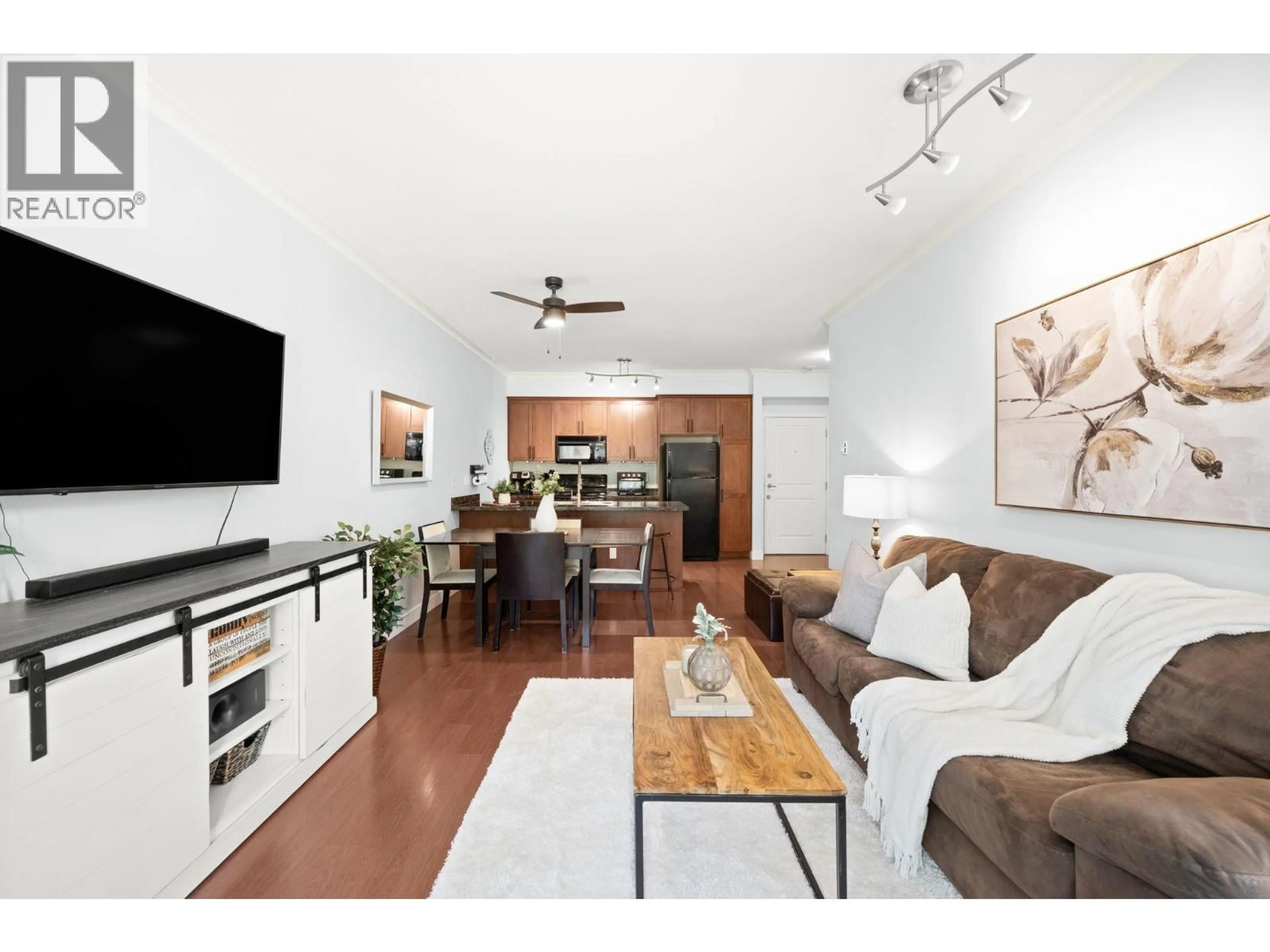 Living room with furniture, wood/laminate floor for 206 - 1375 VIEW CRESCENT, Delta British Columbia V4L0A3