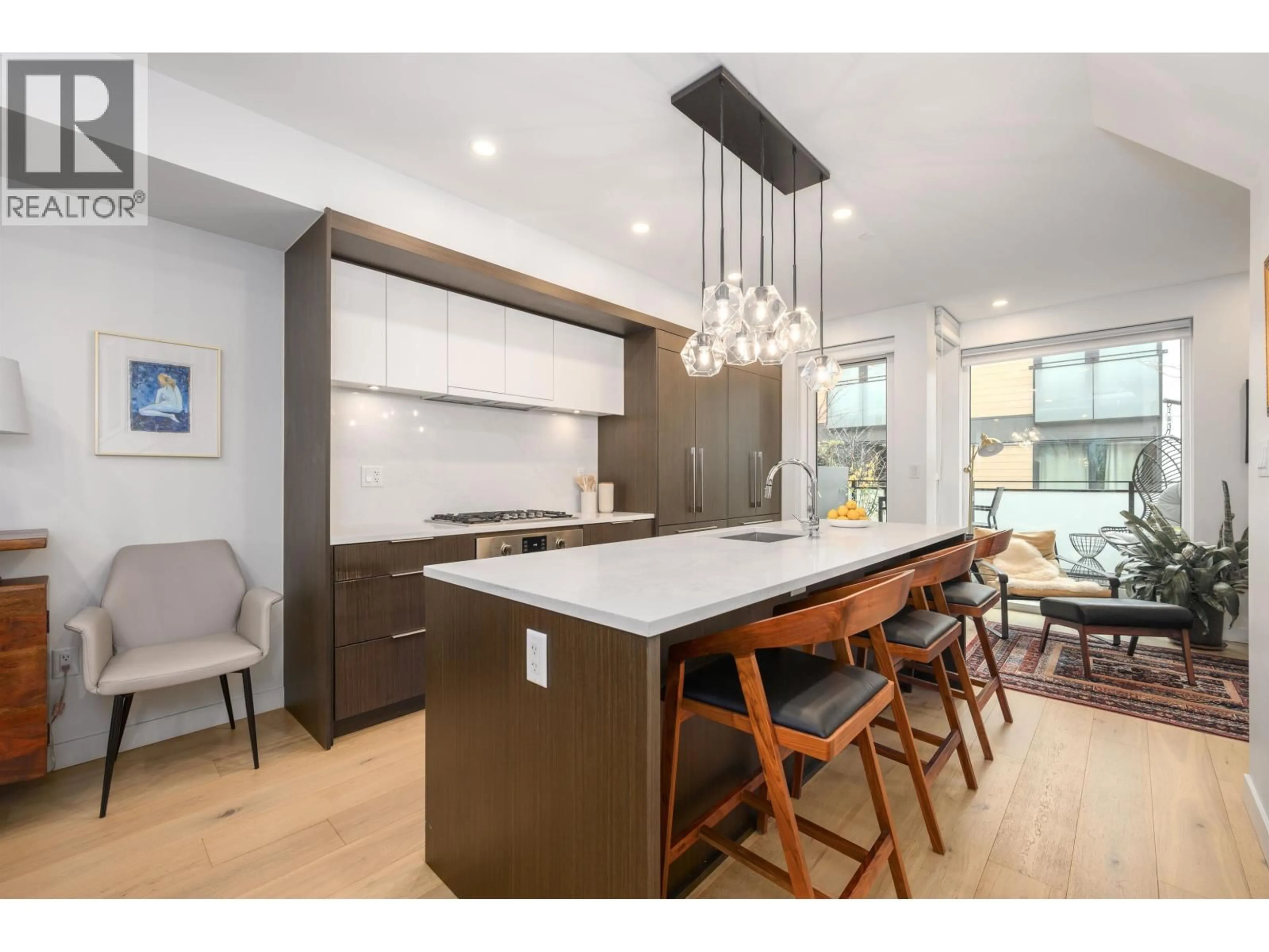 Open concept kitchen, unknown for 206 - 649 3RD STREET, North Vancouver British Columbia V7L1G6
