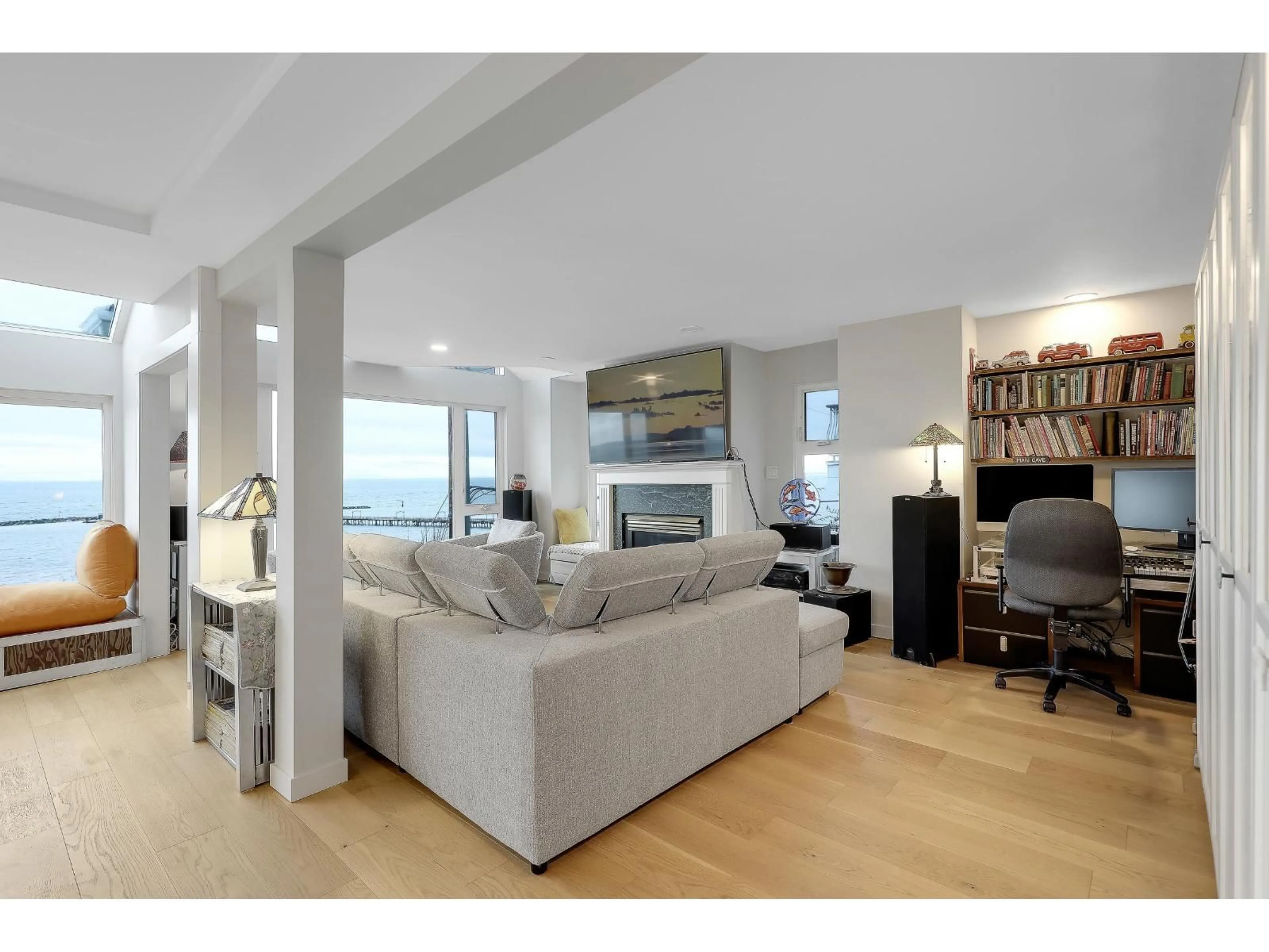 Living room with furniture, wood/laminate floor for 204 - 15165 MARINE DRIVE, White Rock British Columbia V4B1C5