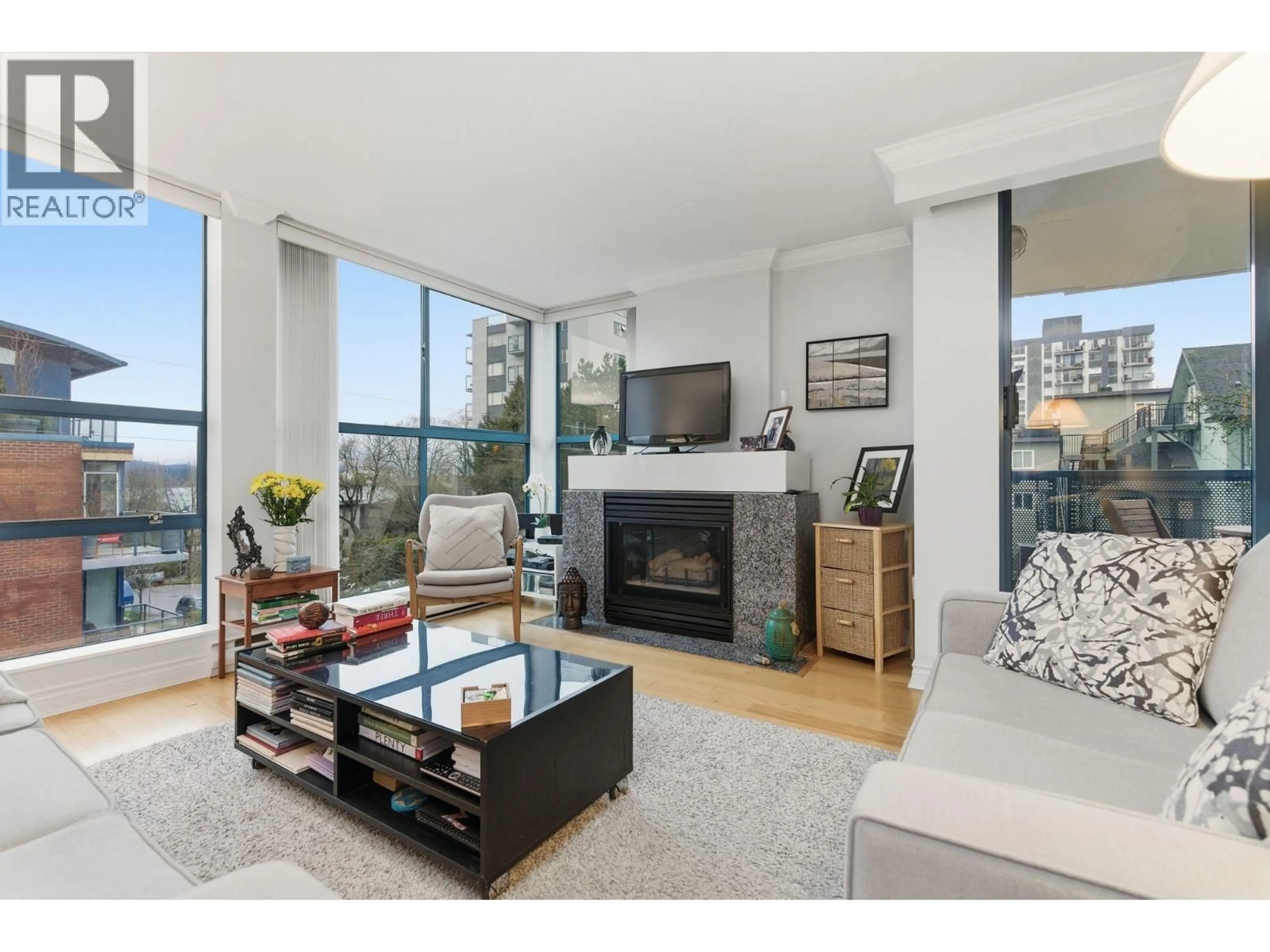 Living room with furniture, unknown for 203 - 2405 2ND AVENUE, Vancouver British Columbia V6K1J5