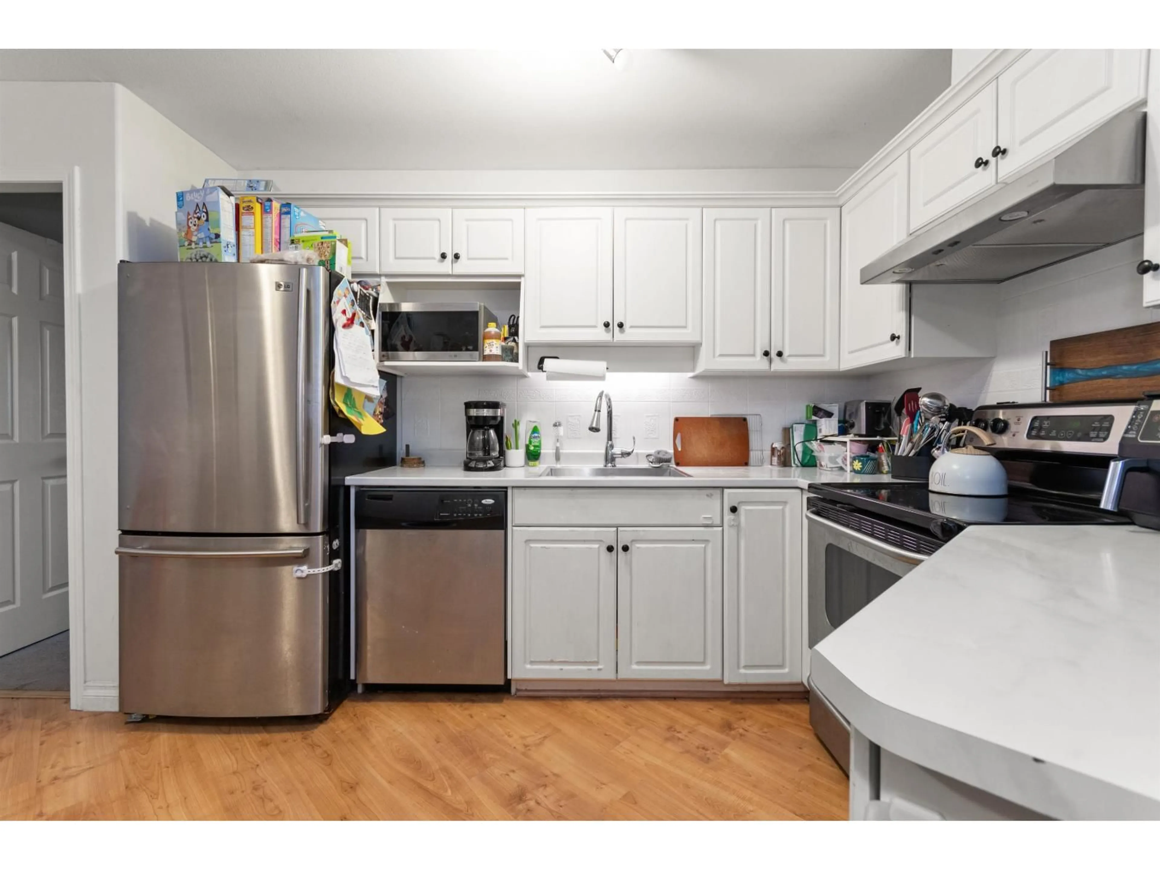 Standard kitchen, wood/laminate floor for 308 - 5765 VEDDER ROAD, Chilliwack British Columbia V2R1C3