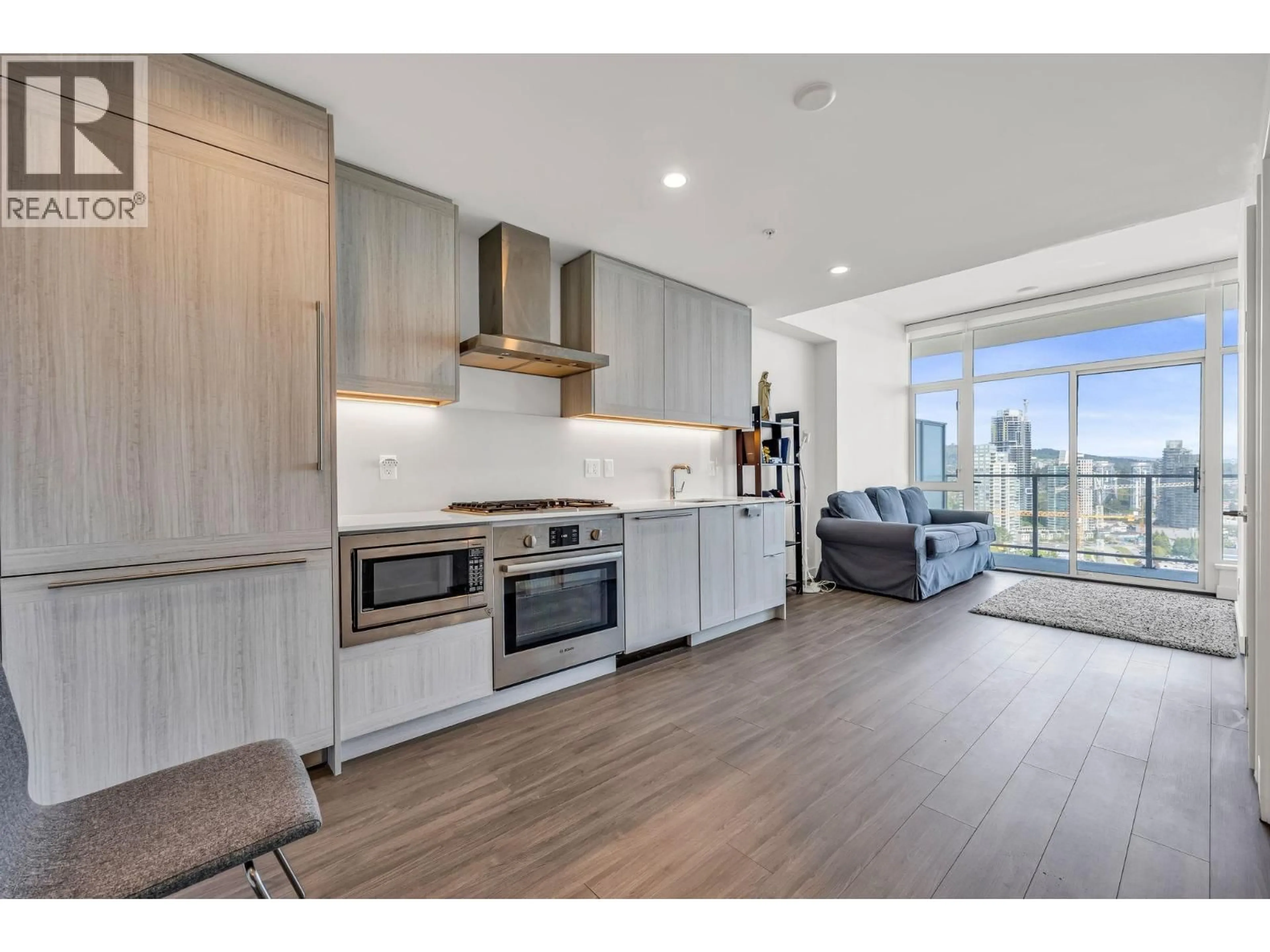 Open concept kitchen, wood/laminate floor for 2502 - 2351 BETA AVENUE, Burnaby British Columbia V5C0M2