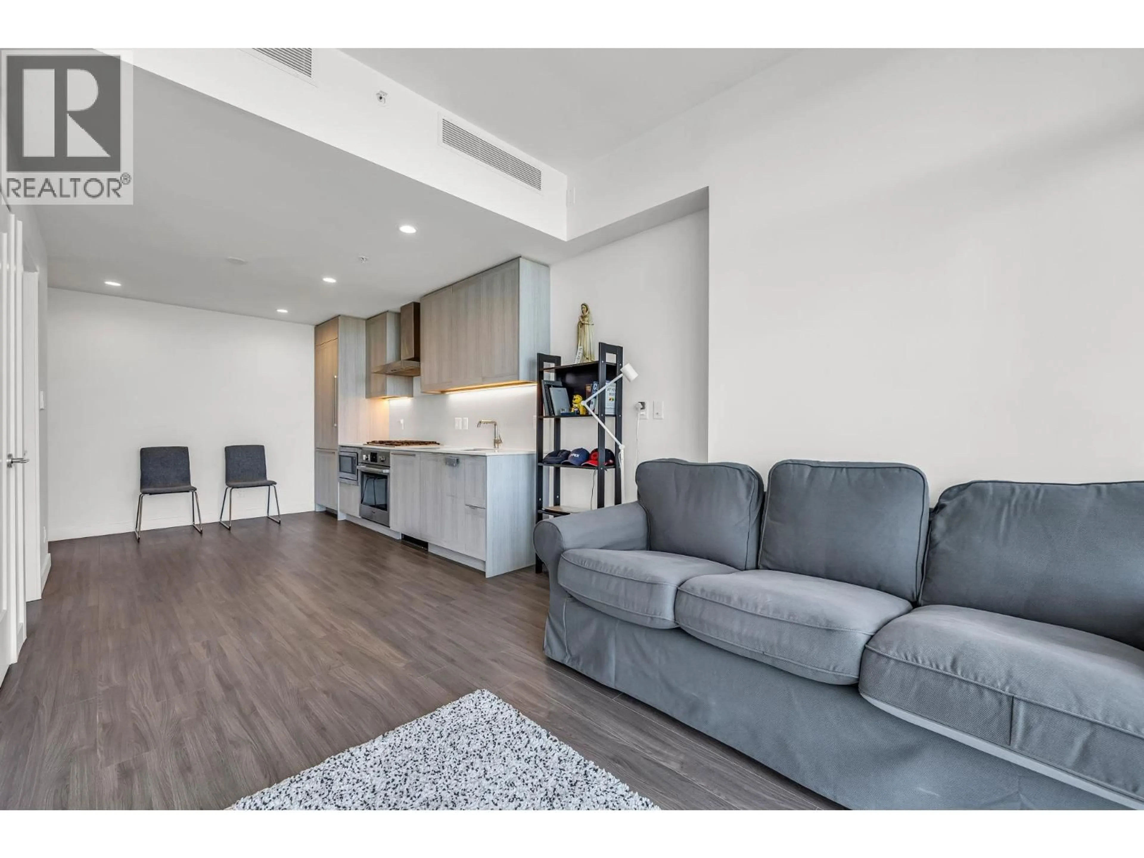 Living room with furniture, wood/laminate floor for 2502 - 2351 BETA AVENUE, Burnaby British Columbia V5C0M2