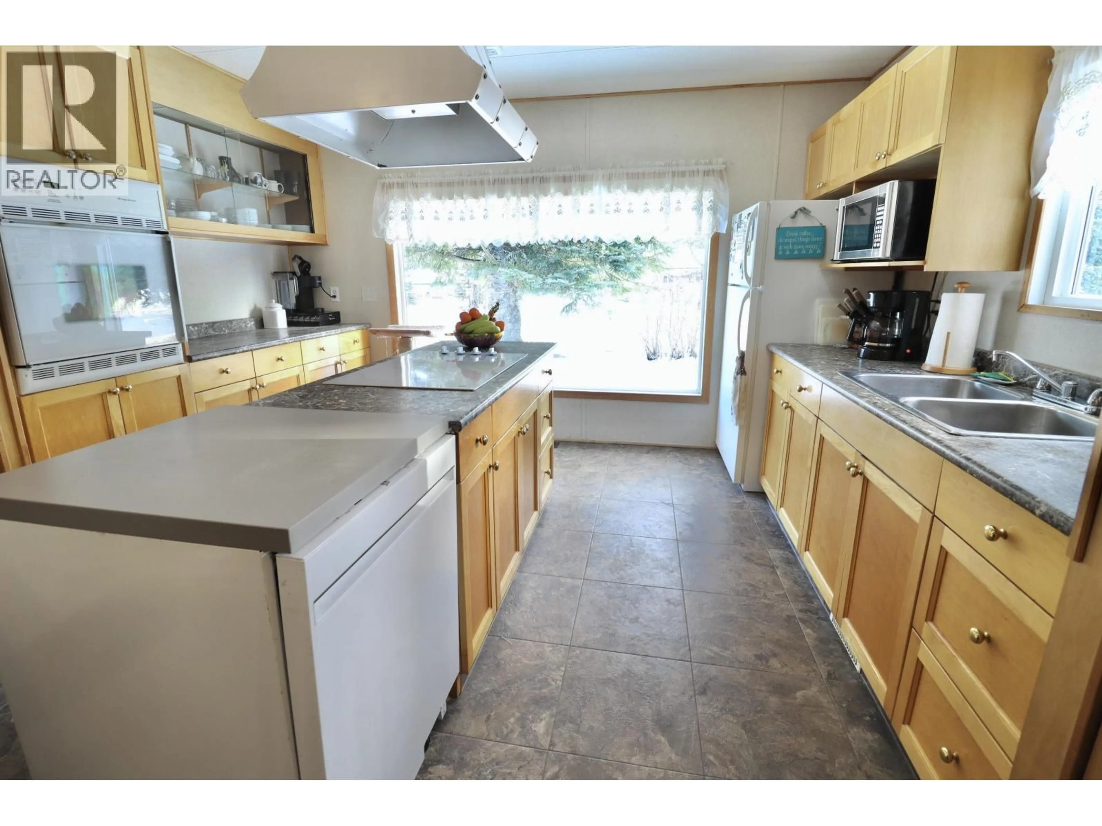 Standard kitchen, ceramic/tile floor for 7775 SABYAM ROAD, Prince George British Columbia V2N2K4