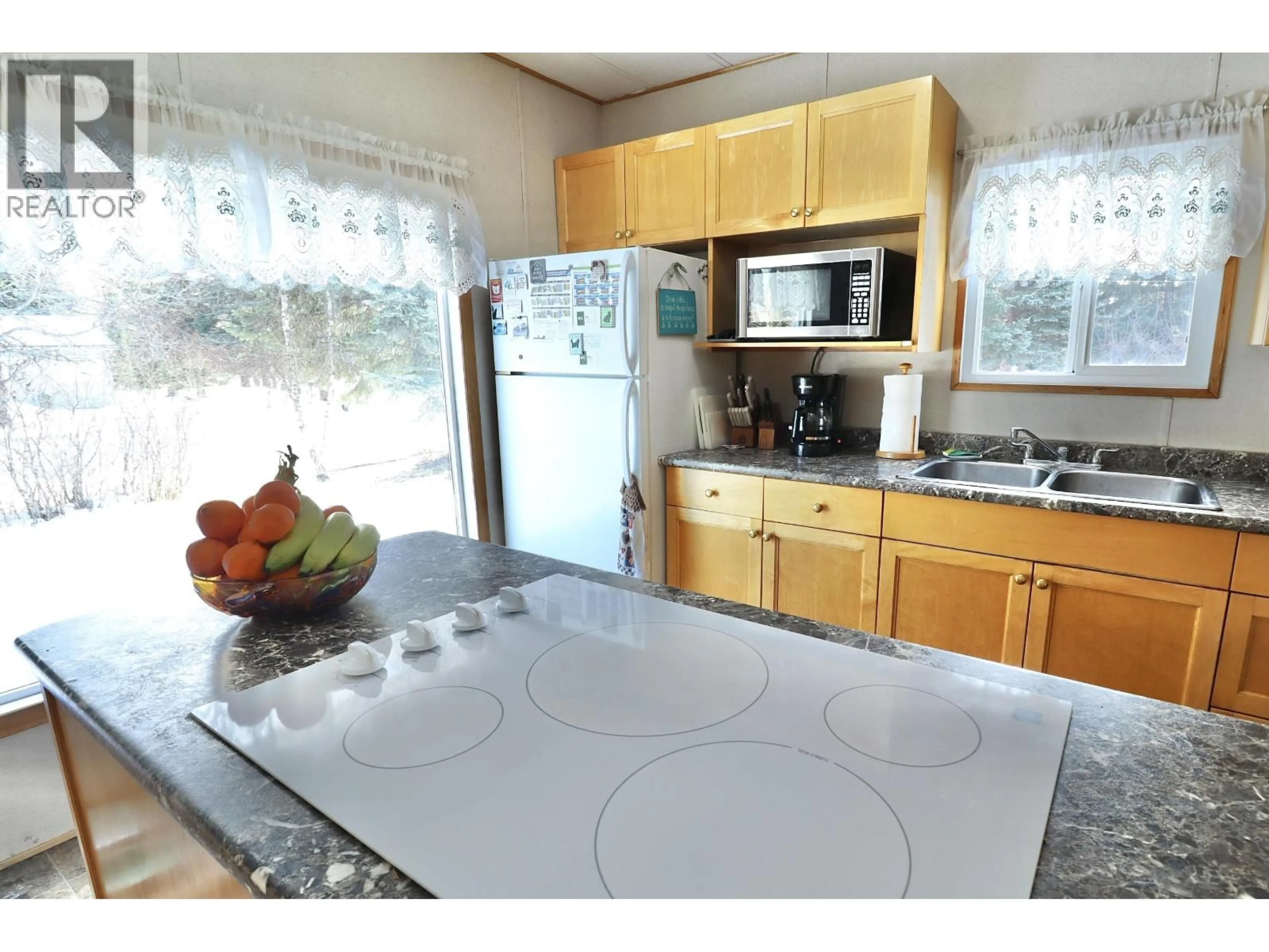 Standard kitchen, ceramic/tile floor for 7775 SABYAM ROAD, Prince George British Columbia V2N2K4