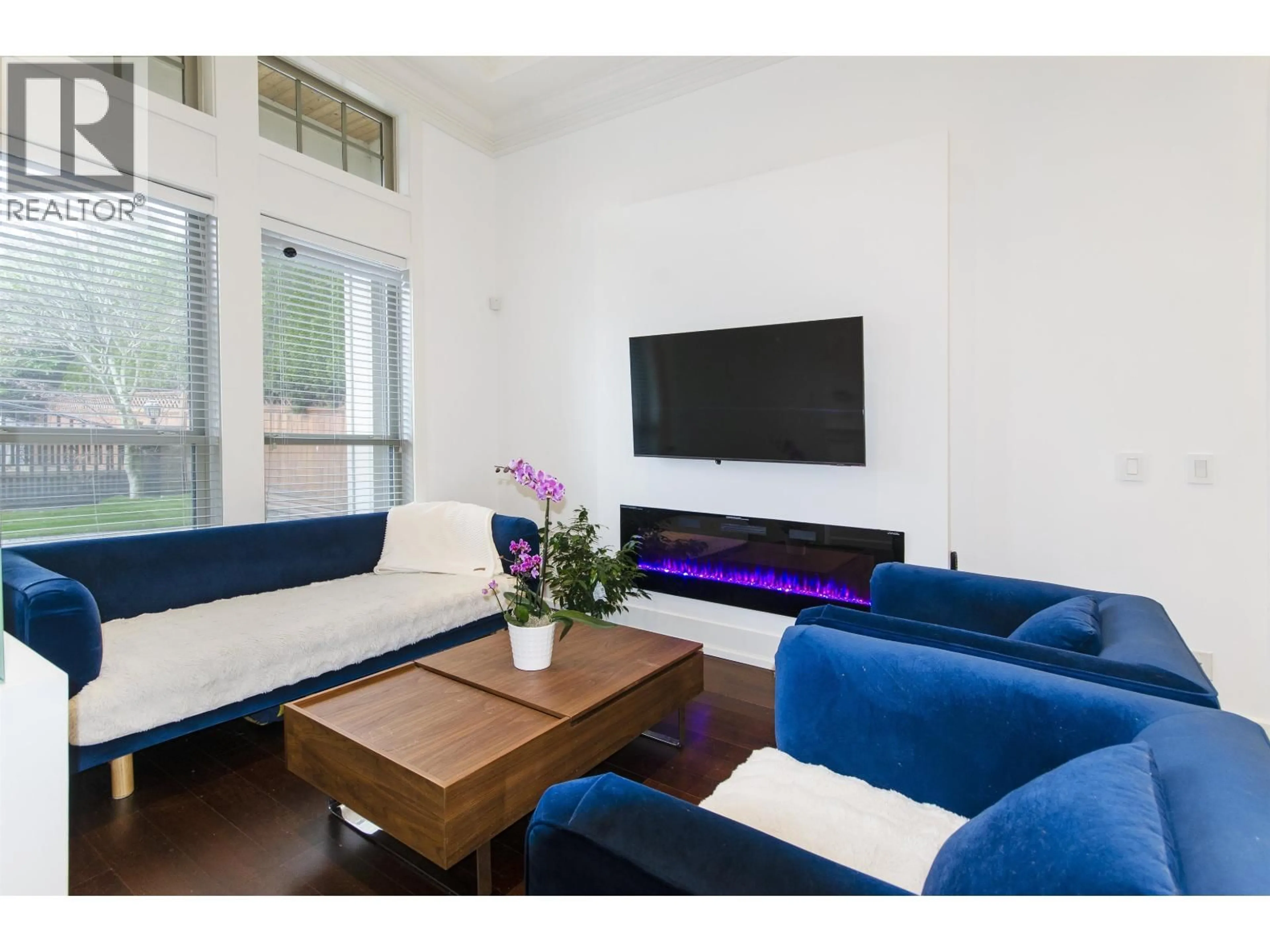 Living room with furniture, wood/laminate floor for 7682 ARMSTRONG STREET, Richmond British Columbia V6Y0C5