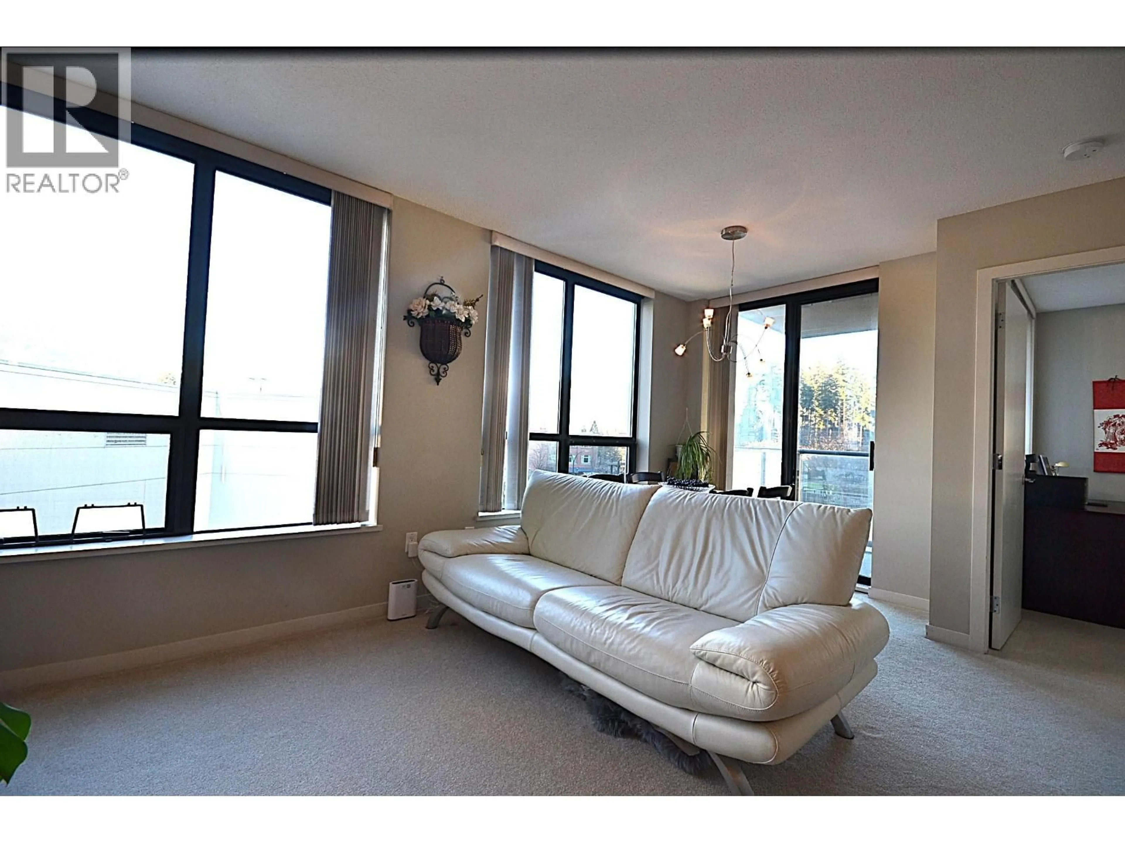 Living room with furniture, unknown for 602 - 2979 GLEN DRIVE, Coquitlam British Columbia V3B0B2