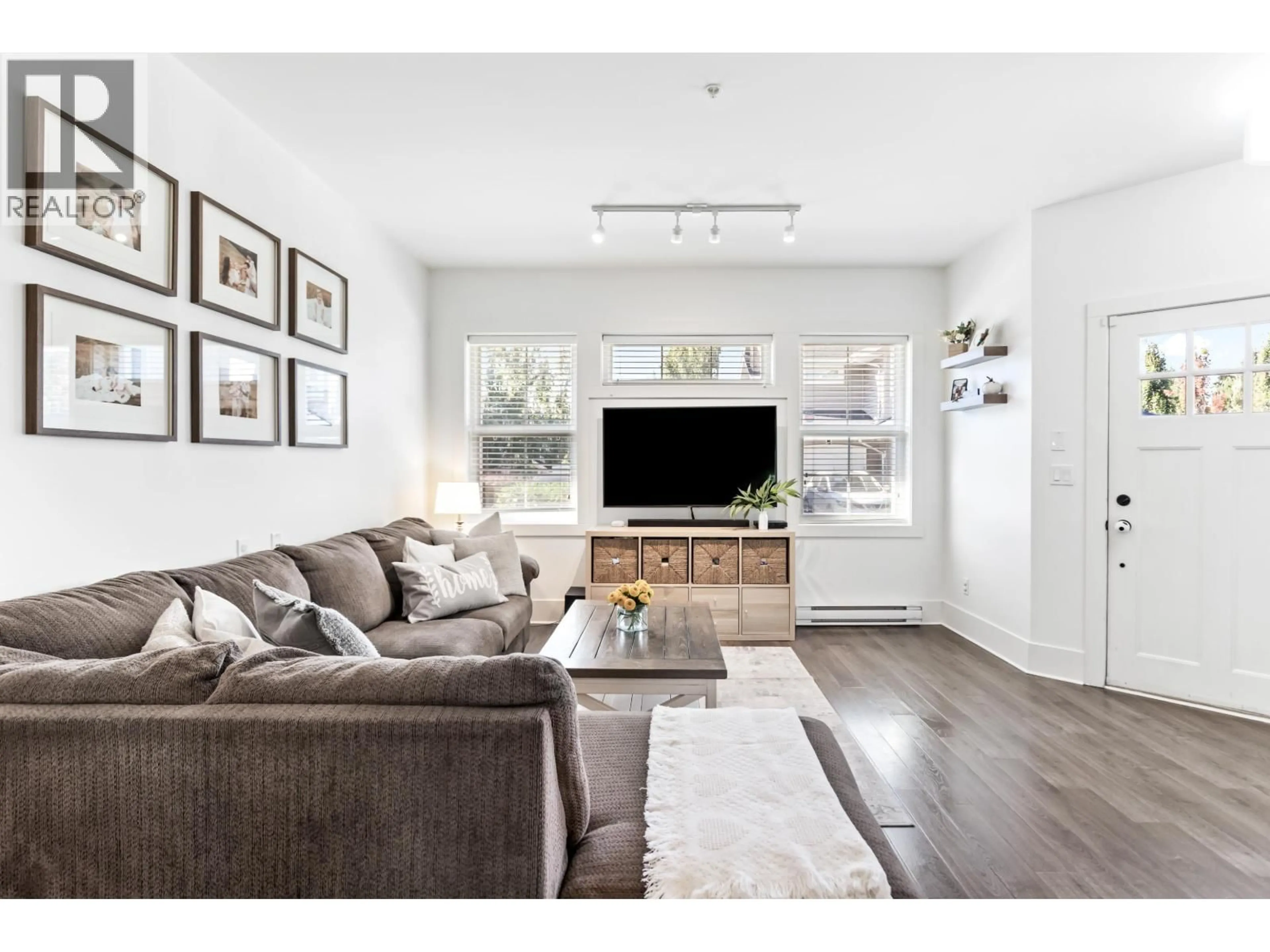 Living room with furniture, wood/laminate floor for 37 - 12161 237 STREET, Maple Ridge British Columbia V4R0E7