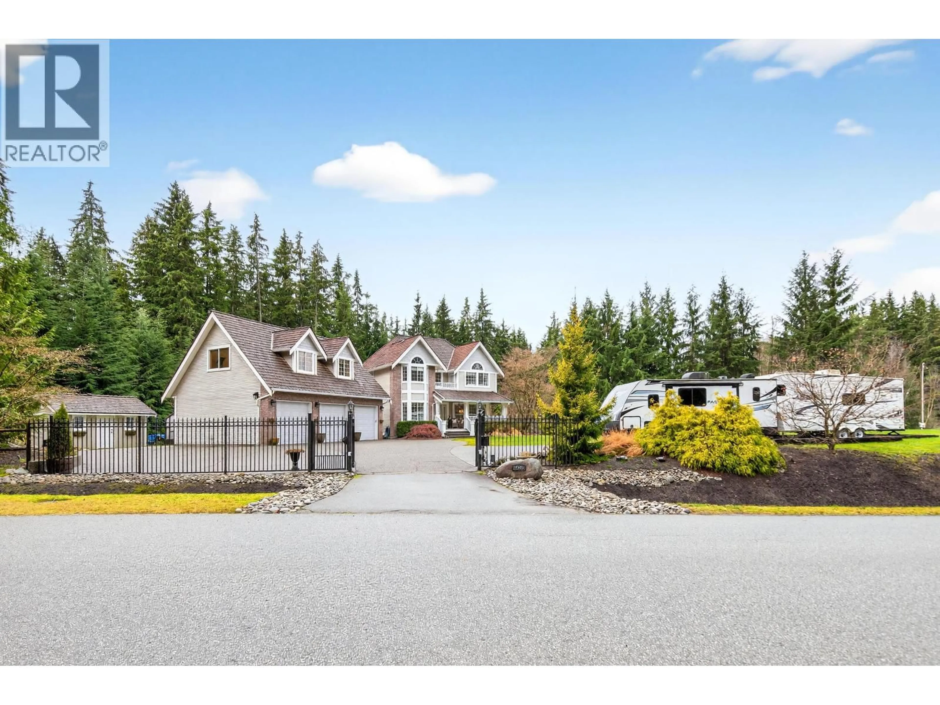 A pic from outside/outdoor area/front of a property/back of a property/a pic from drone, mountain view for 12595 266 STREET, Maple Ridge British Columbia V2W1C9
