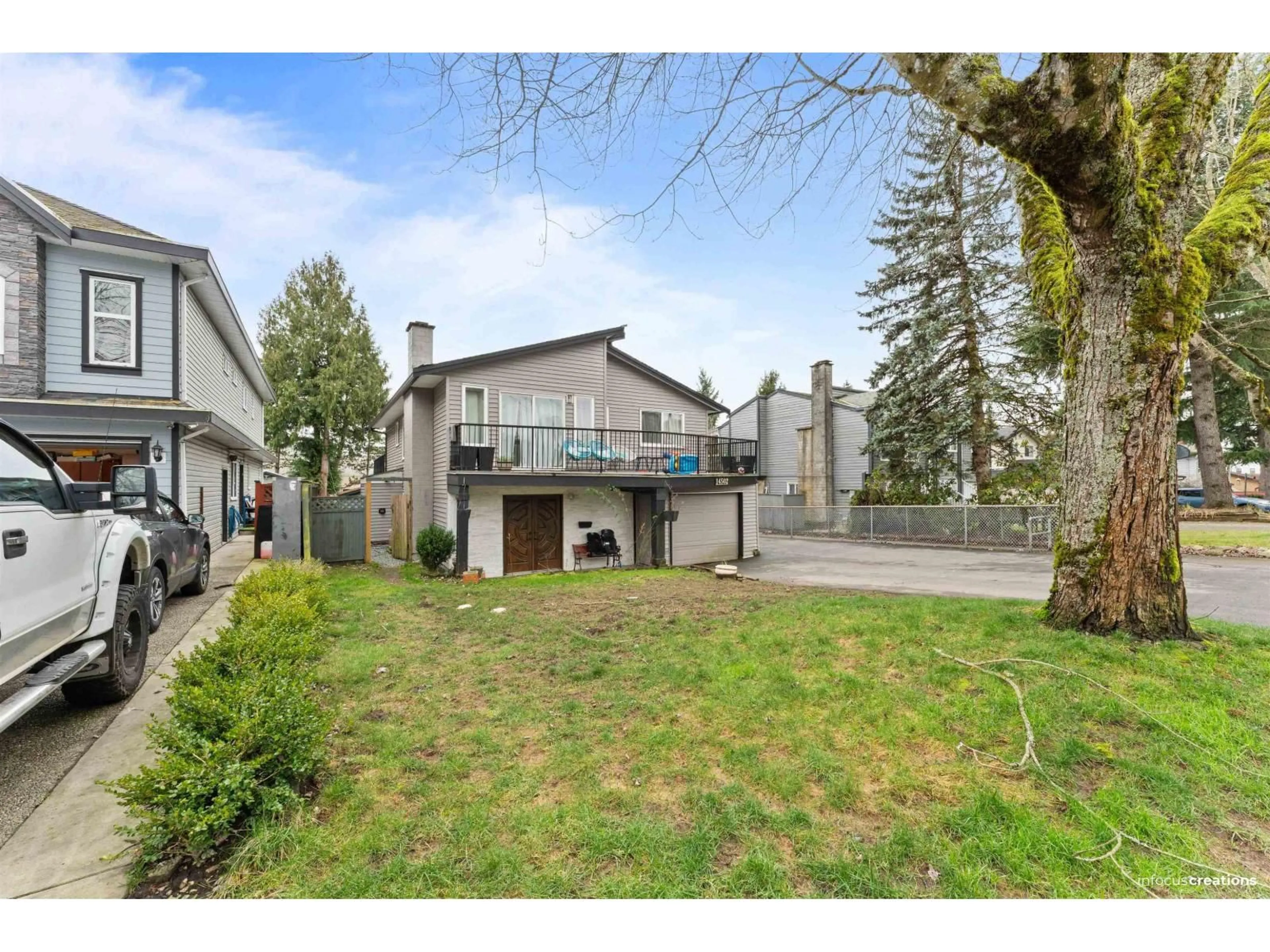 A pic from outside/outdoor area/front of a property/back of a property/a pic from drone, street for 14502 85A AVENUE, Surrey British Columbia V3S5T6
