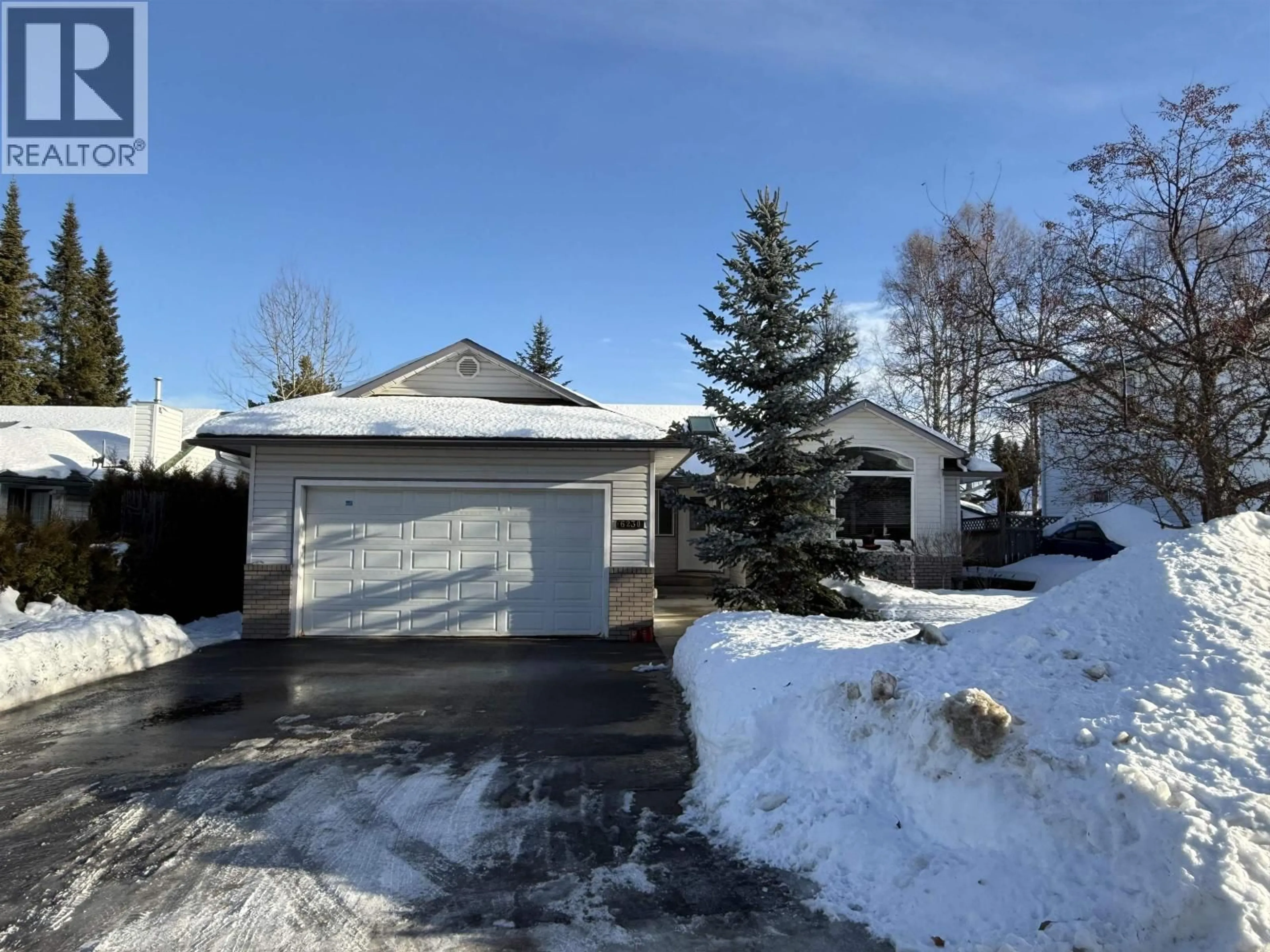 A pic from outside/outdoor area/front of a property/back of a property/a pic from drone, street for 6230 BERGER CRESCENT, Prince George British Columbia V2K4S9