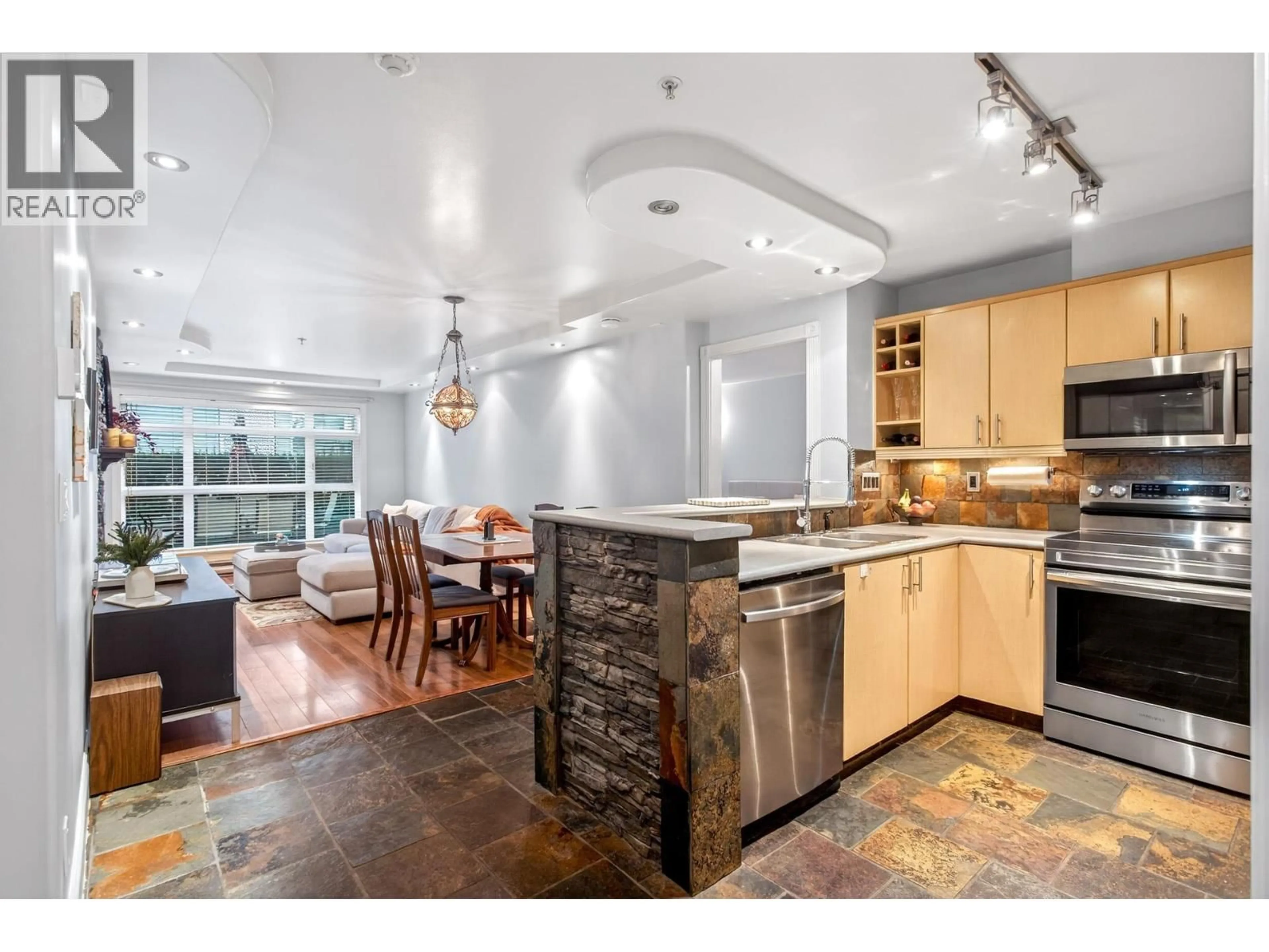 Open concept kitchen, ceramic/tile floor for 102 - 3122 ST JOHNS STREET, Port Moody British Columbia V3H5C8