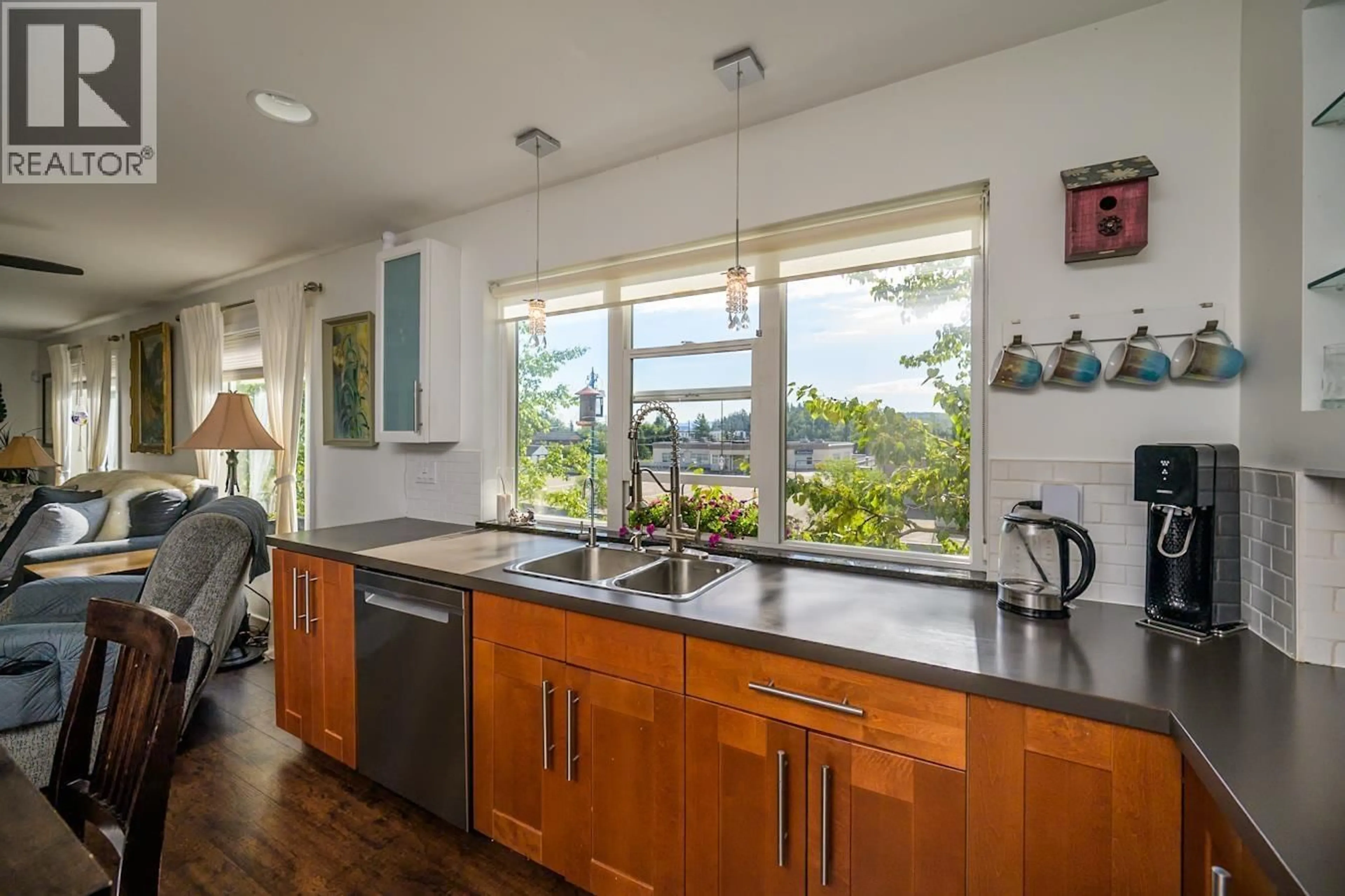 Open concept kitchen, unknown for 1807 12TH AVENUE, Prince George British Columbia V2M1P8