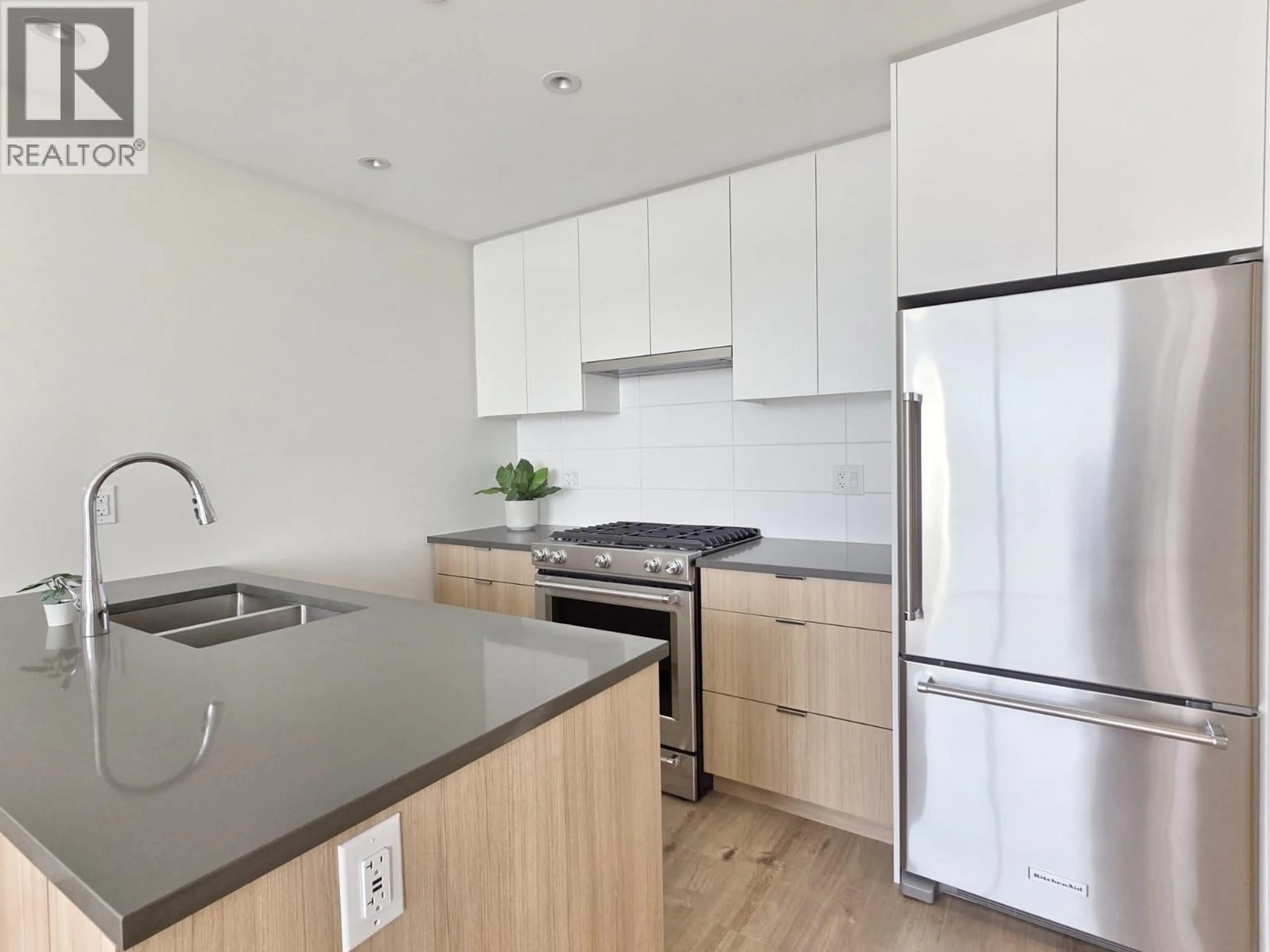 Standard kitchen, wood/laminate floor for 1503 - 3430 E KENT AVENUE, Vancouver British Columbia V5S0G7