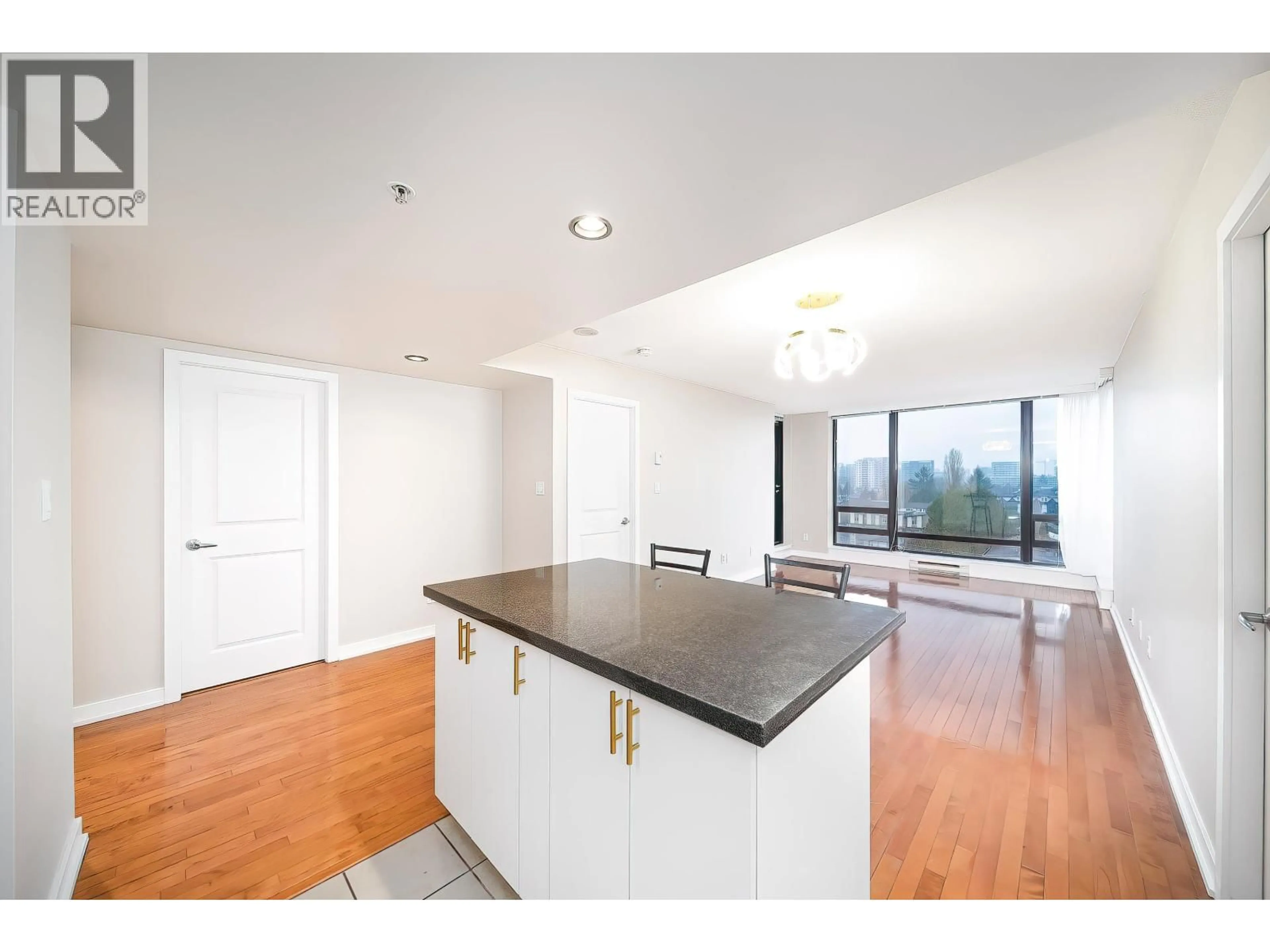 Open concept kitchen, wood/laminate floor for 906 - 9188 HEMLOCK DRIVE, Richmond British Columbia V6Y4J7