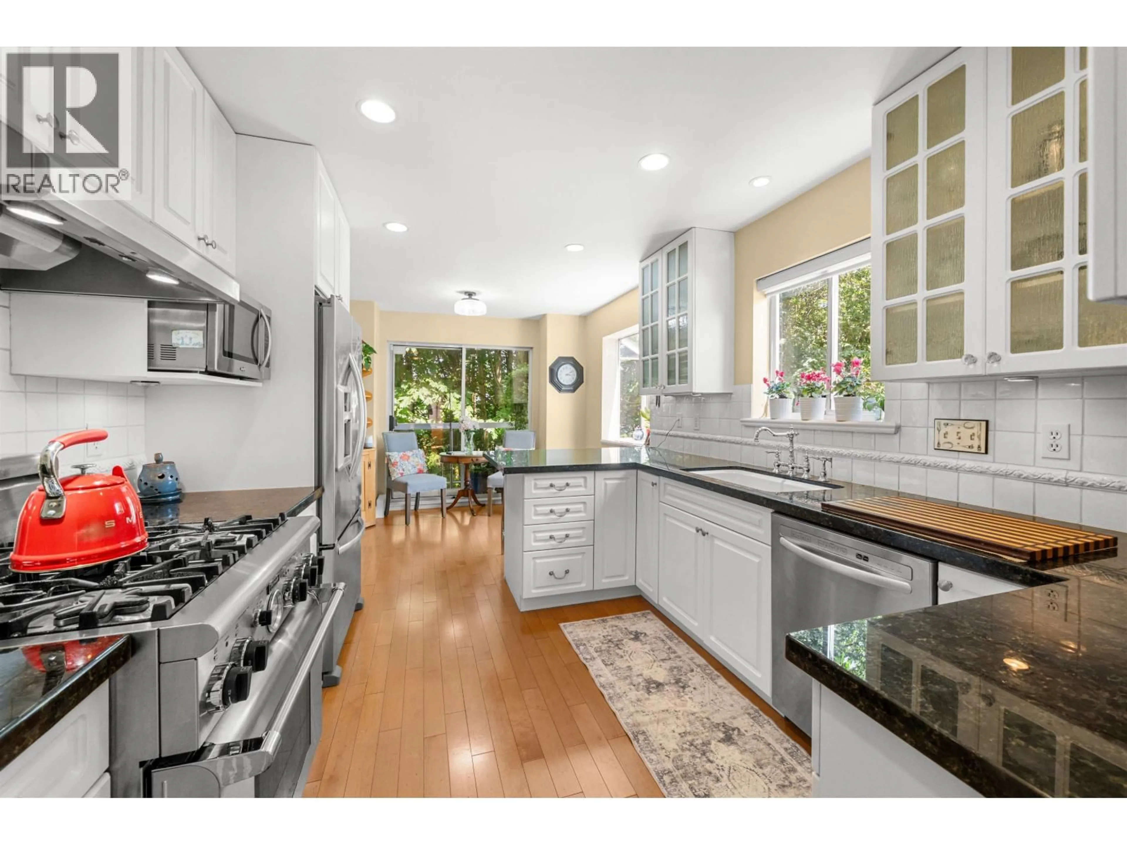 Open concept kitchen, ceramic/tile floor for 22 - 72 JAMIESON COURT, New Westminster British Columbia V3L5R6