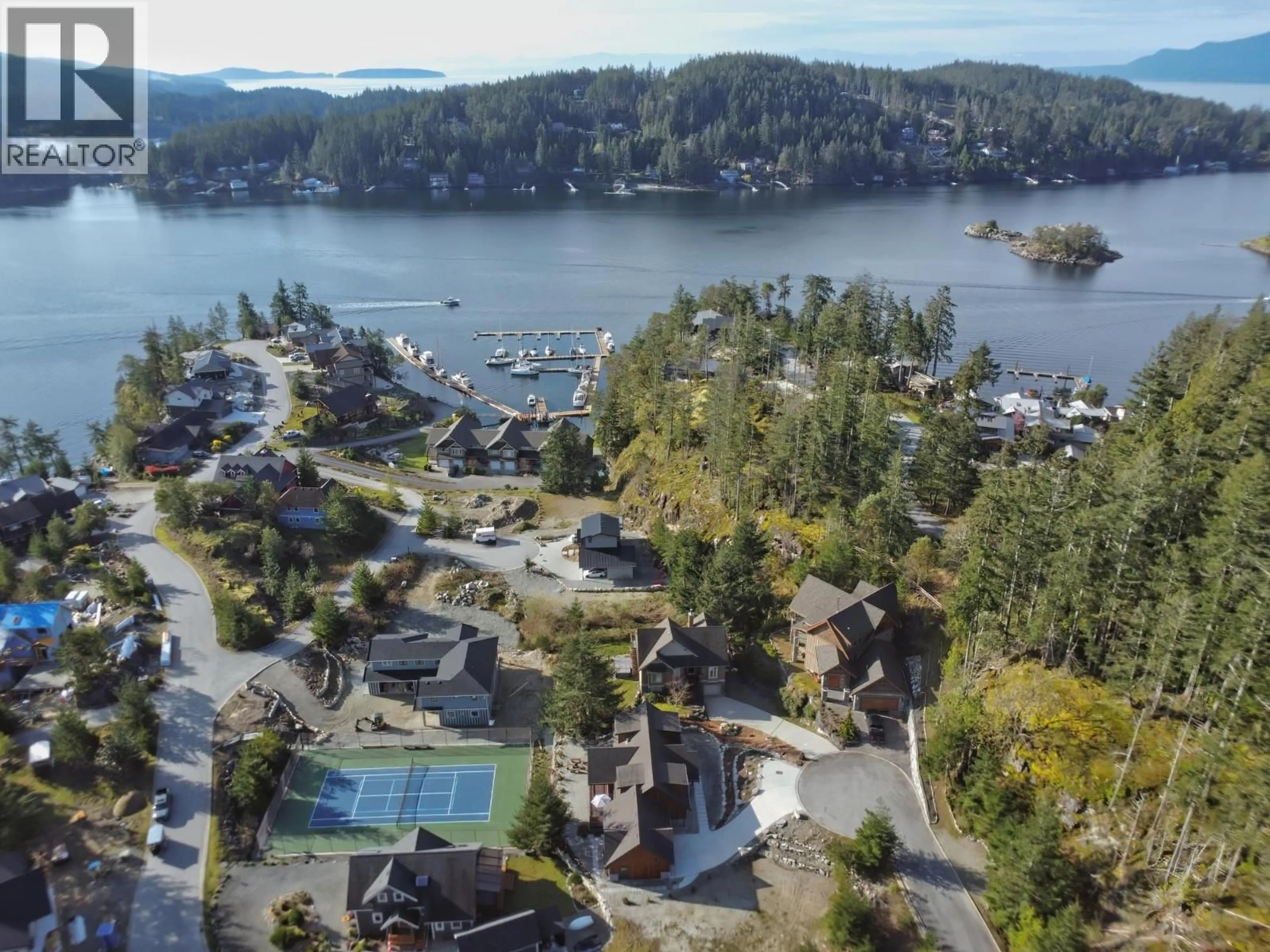 A pic from outside/outdoor area/front of a property/back of a property/a pic from drone, water/lake/river/ocean view for 40 - 4622 SINCLAIR BAY ROAD, Pender Harbour British Columbia V0N1S1