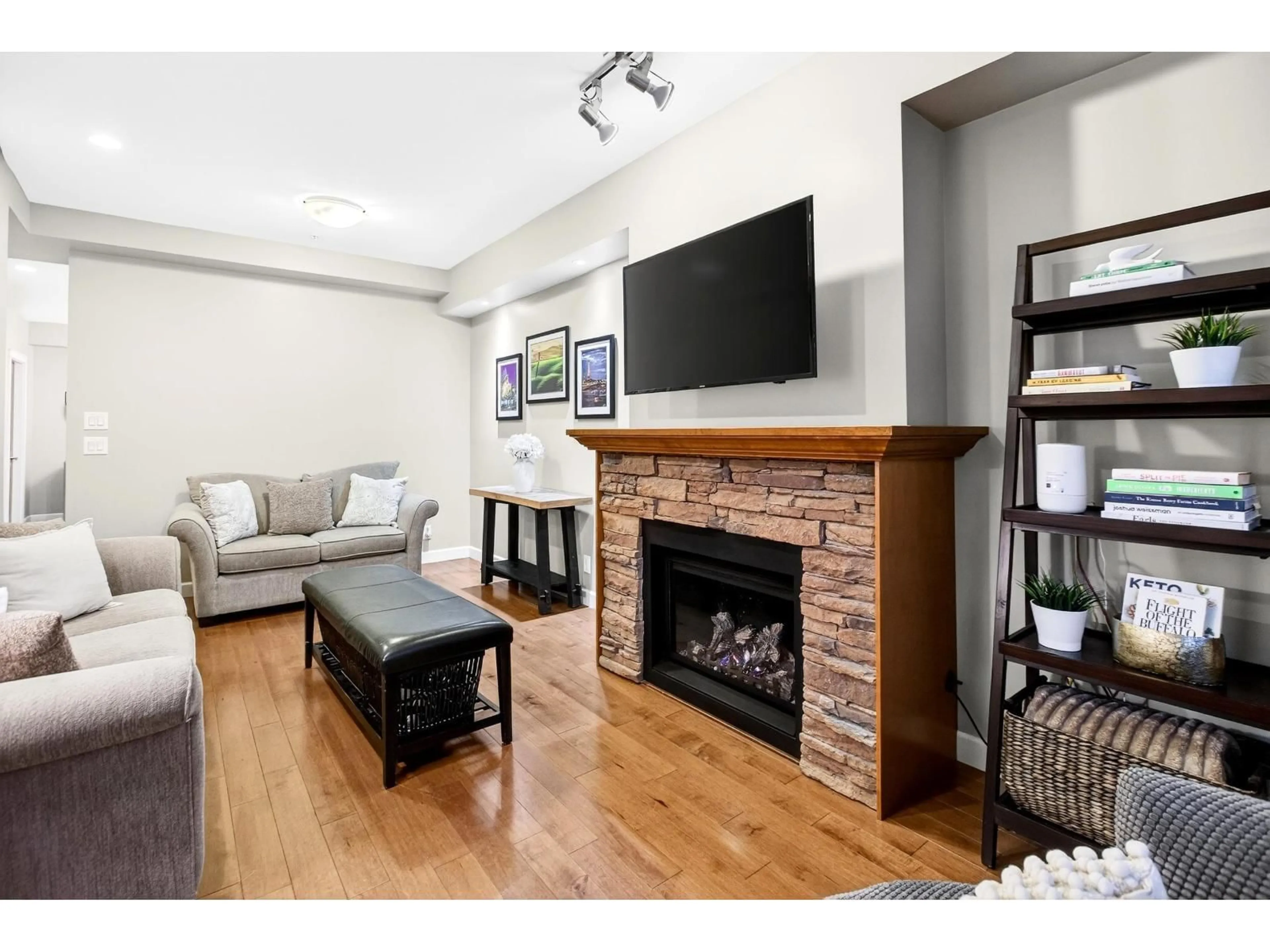 Living room with furniture, wood/laminate floor for 109 - 20738 84 AVENUE, Langley British Columbia V2Y0J6