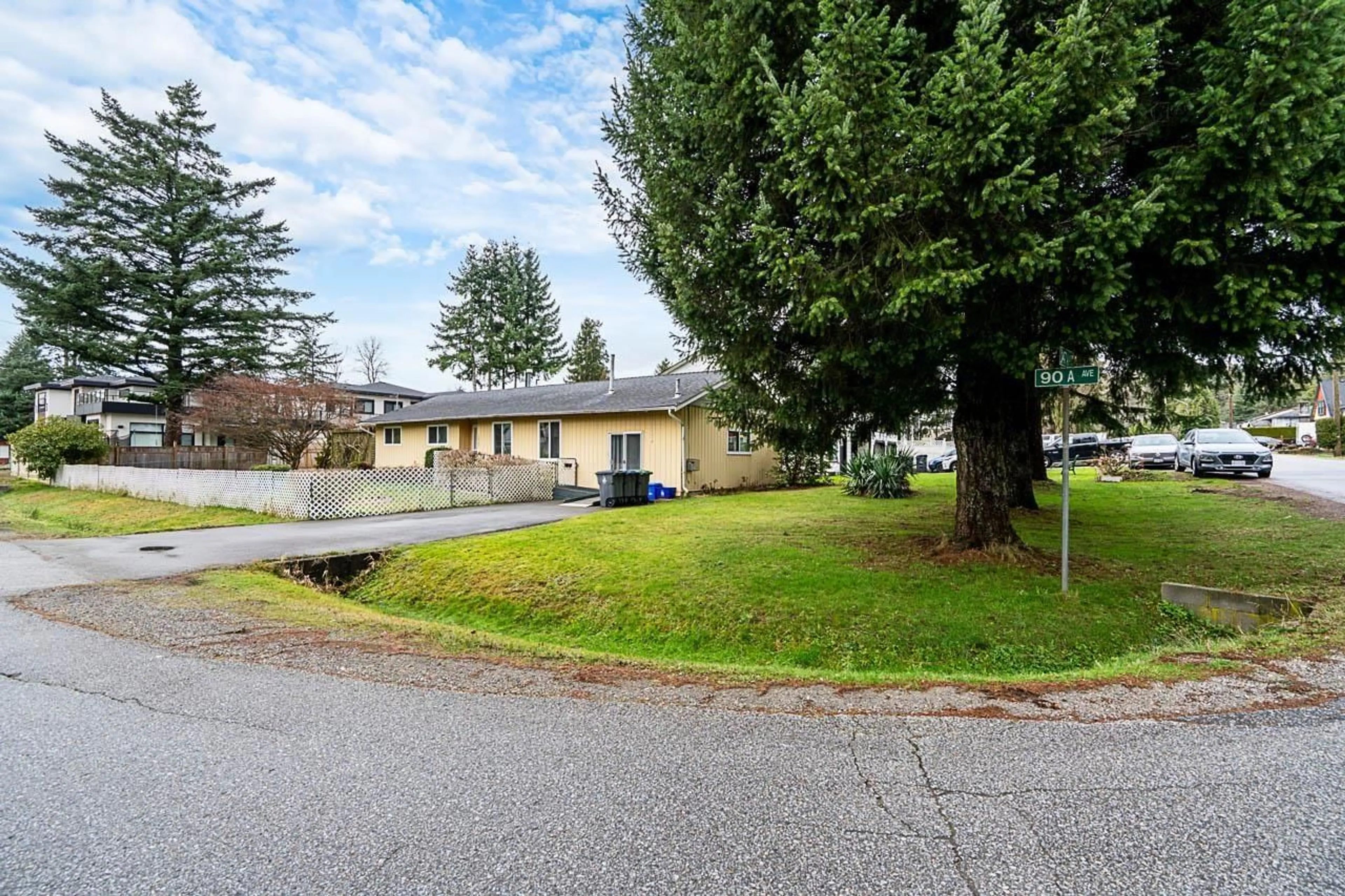 A pic from outside/outdoor area/front of a property/back of a property/a pic from drone, street for 14747 90A AVENUE, Surrey British Columbia V3R5Z9