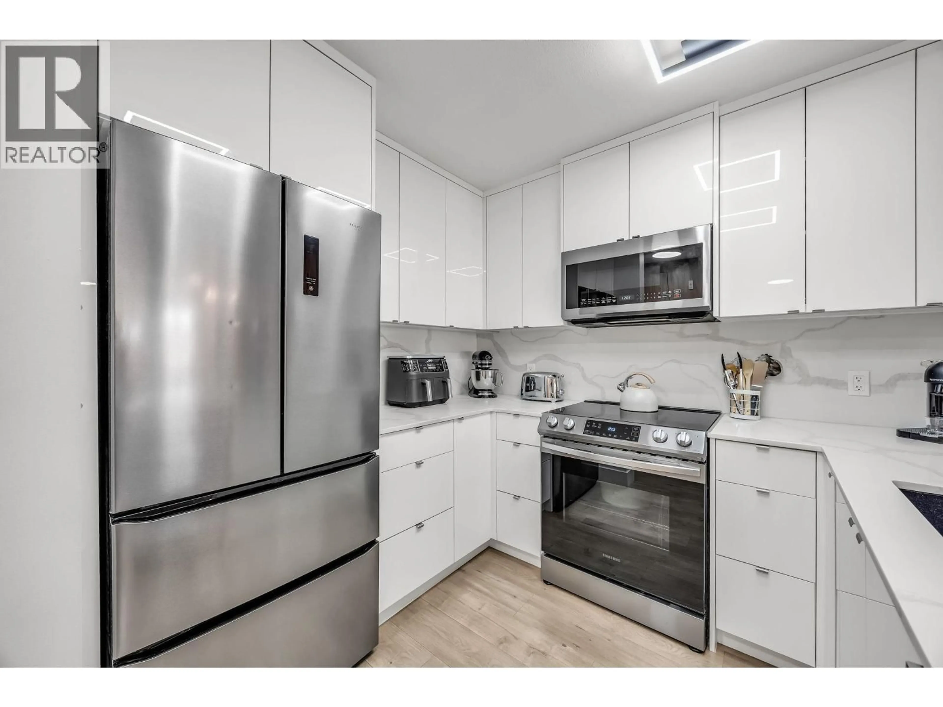 Standard kitchen, unknown for 213 - 3038 KENT AVENUE SOUTH, Vancouver British Columbia V5S4V8