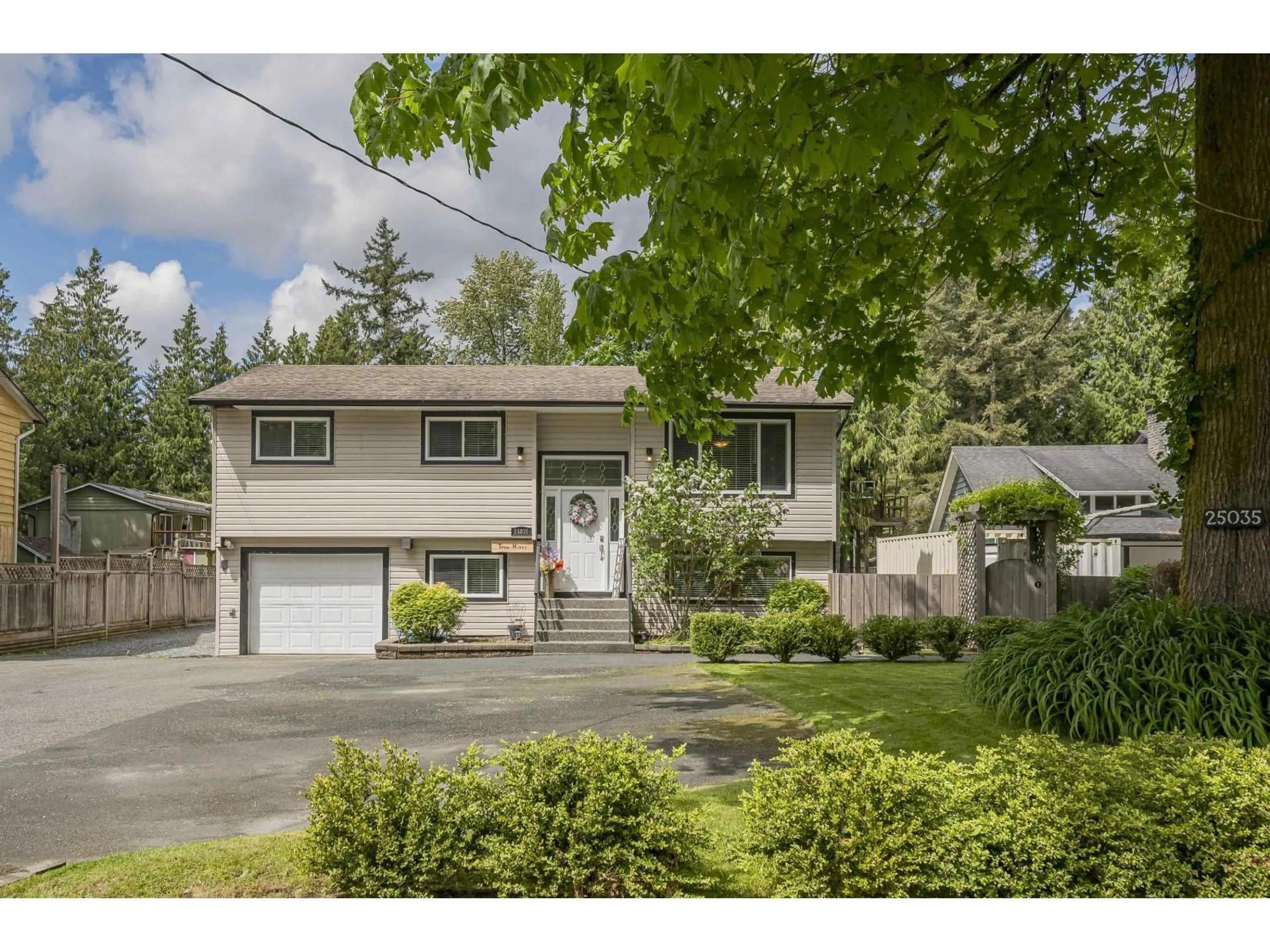 Home with vinyl exterior material, street for 25035 10 AVENUE, Langley British Columbia V4W2S7