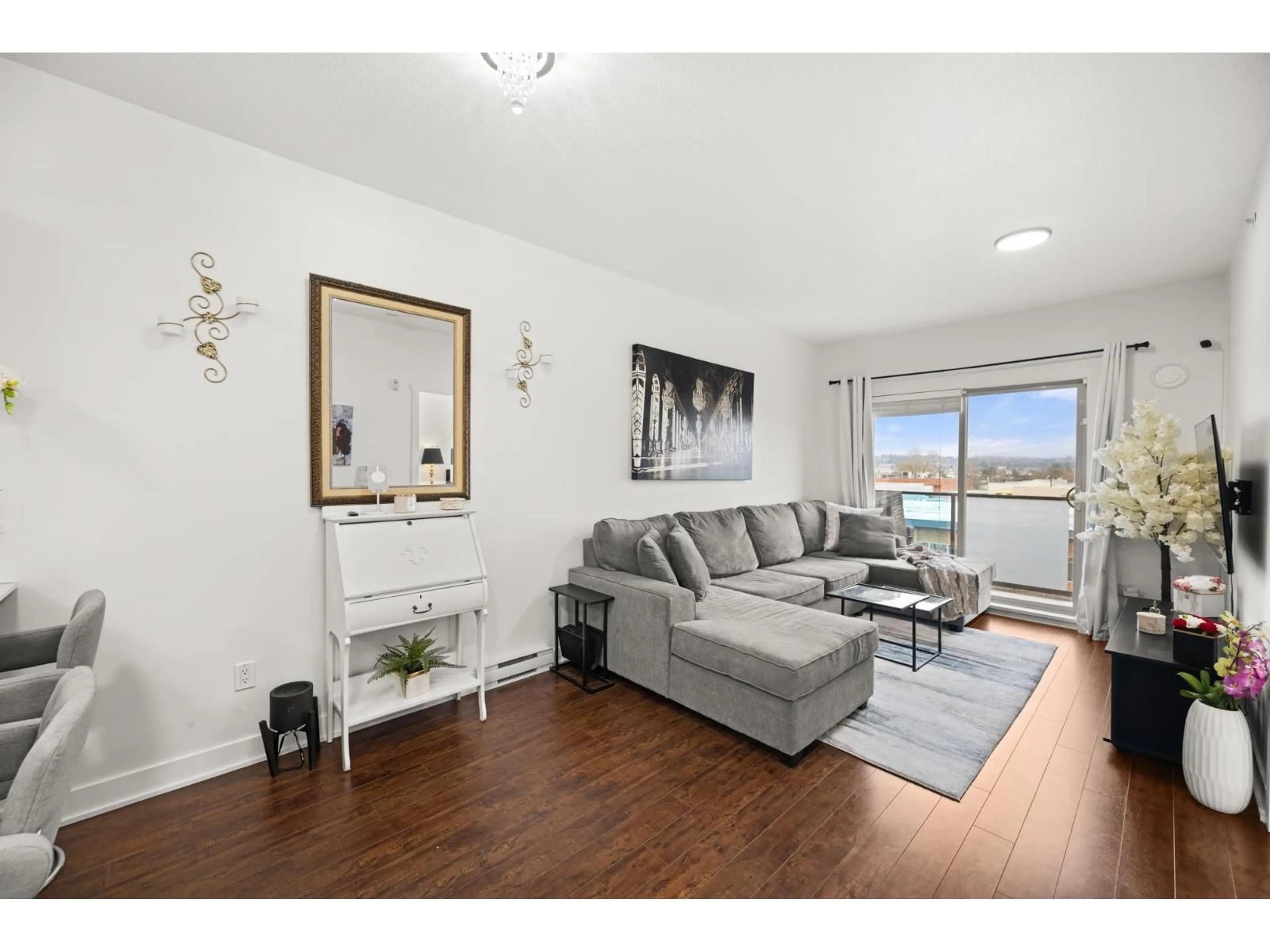 Living room with furniture, wood/laminate floor for 403 - 20460 DOUGLAS CRESCENT, Langley British Columbia V3A0C6