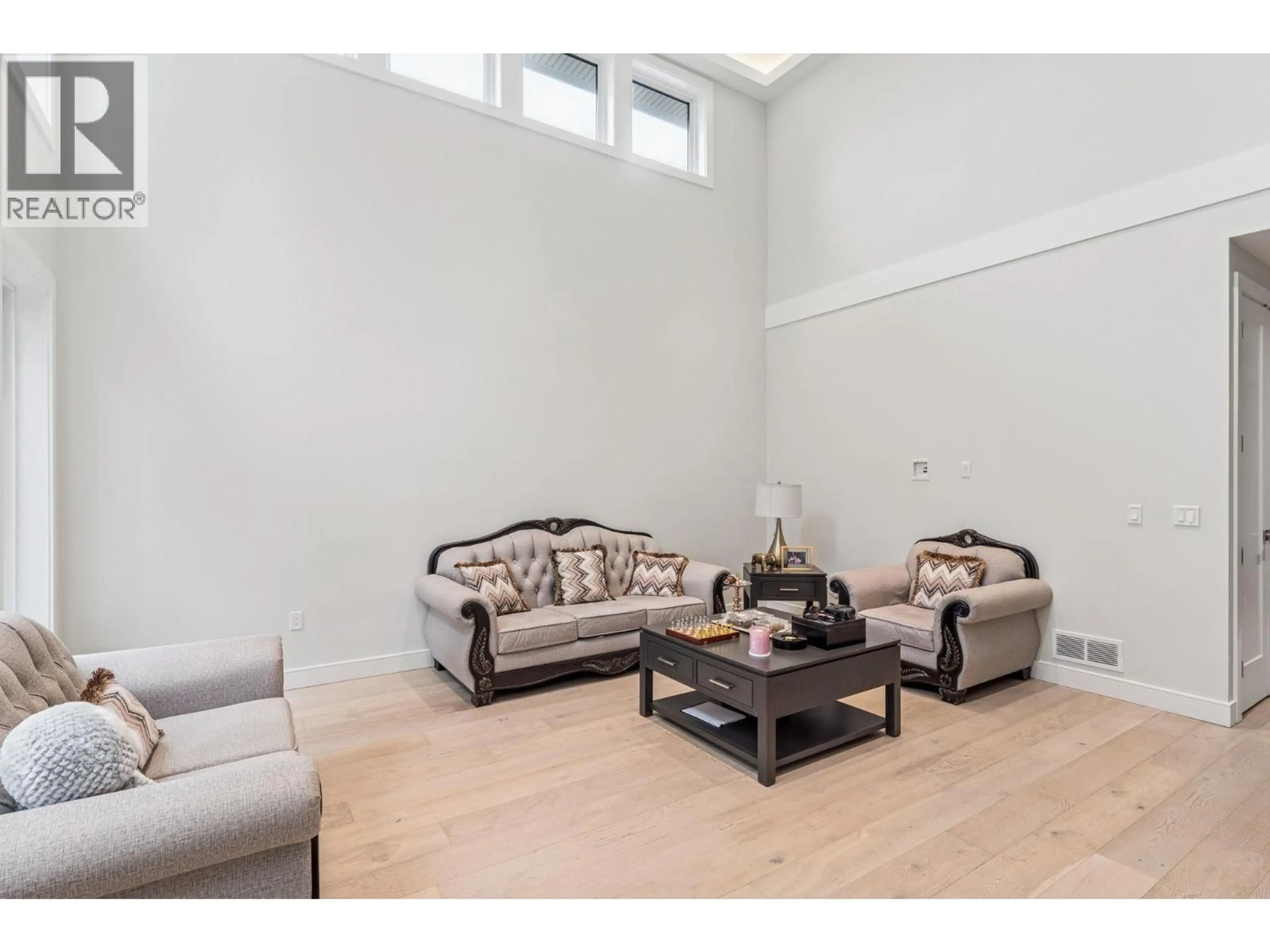 Living room with furniture, wood/laminate floor for 23376 124 AVENUE, Maple Ridge British Columbia V2X4K4