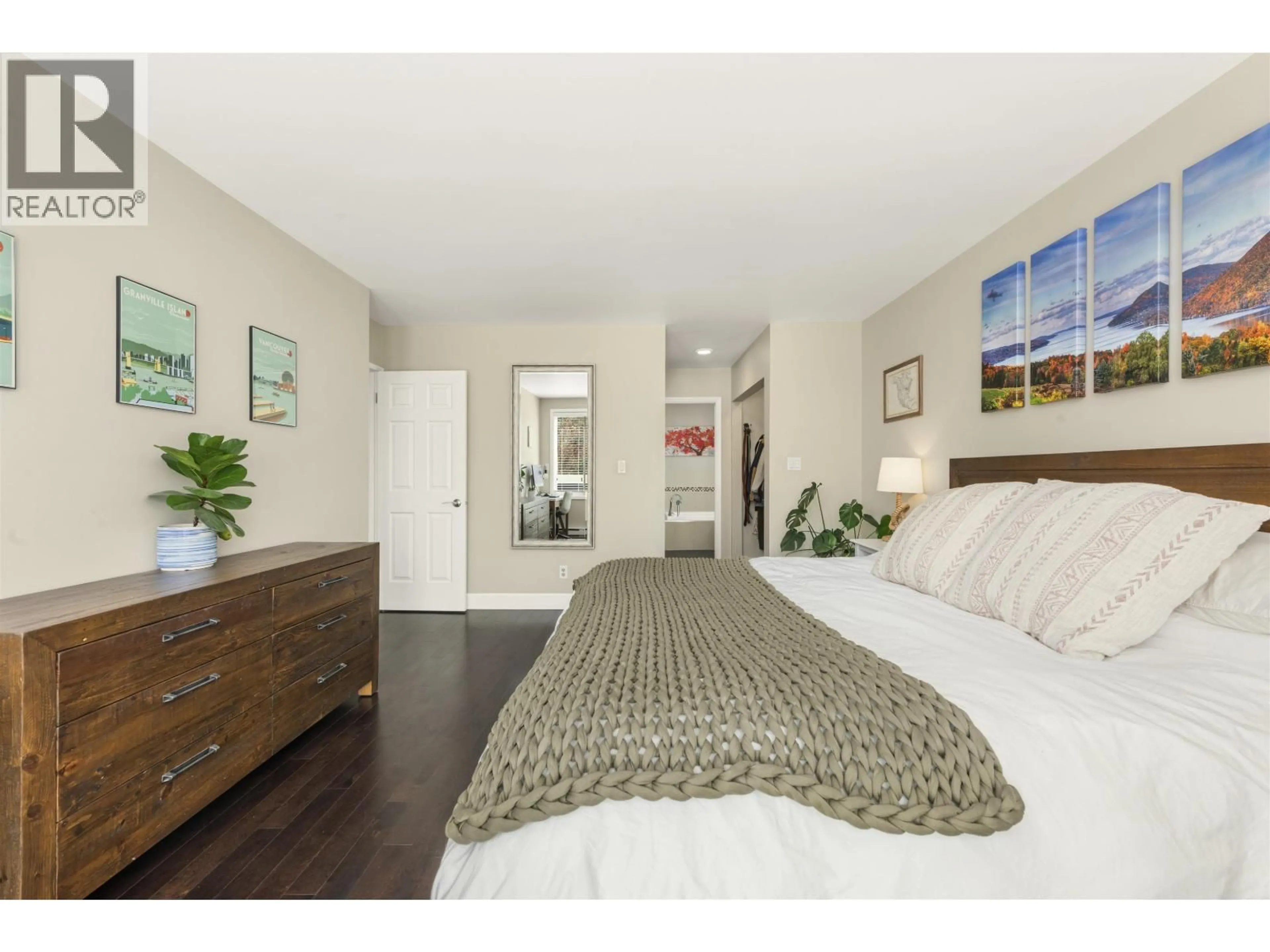 Bedroom with bed, wood/laminate floor for 1858 1ST AVENUE, Vancouver British Columbia V6J1G5