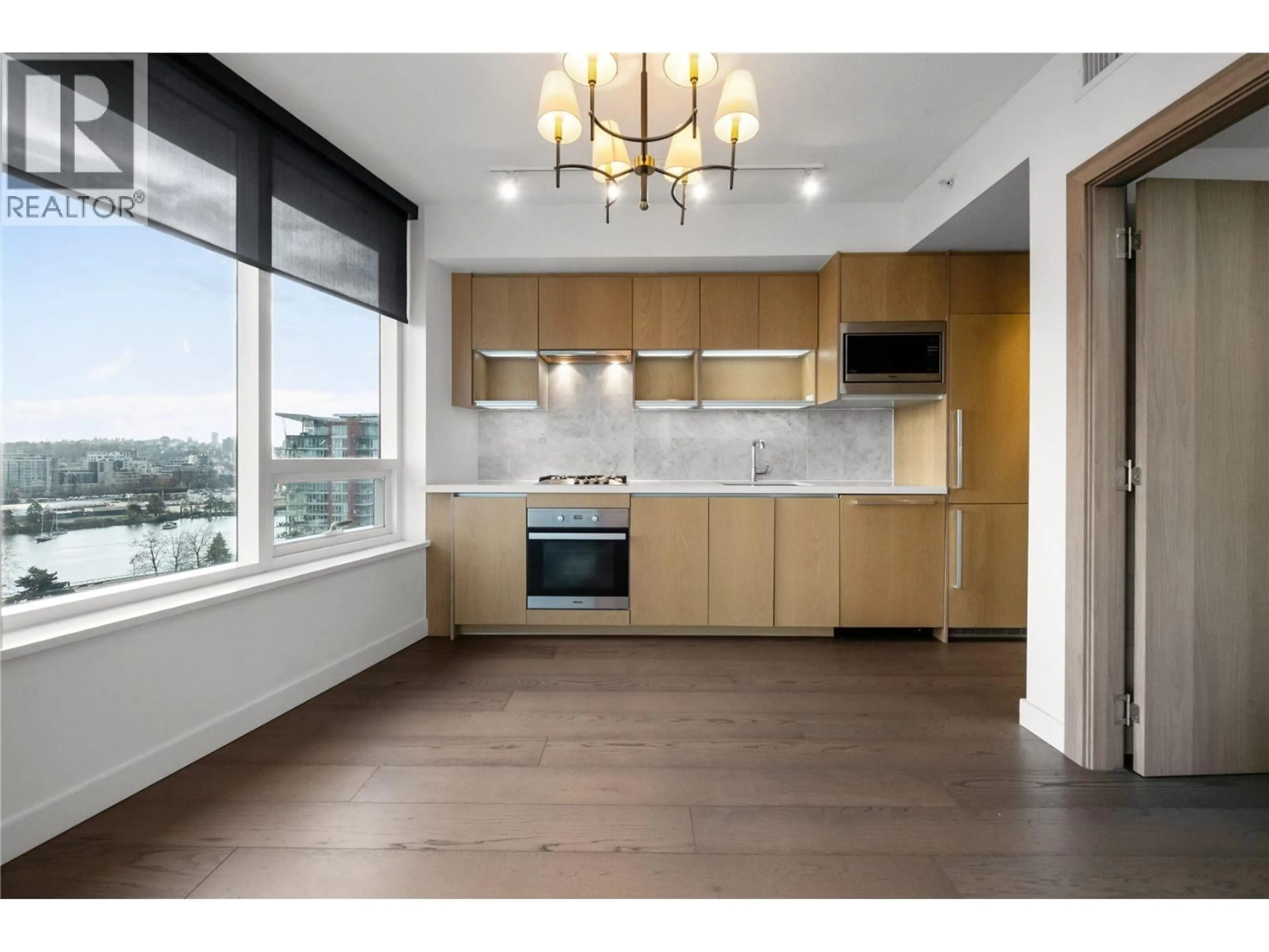 Open concept kitchen, wood/laminate floor for 1256 - 38 SMITHE STREET, Vancouver British Columbia V6B0P3
