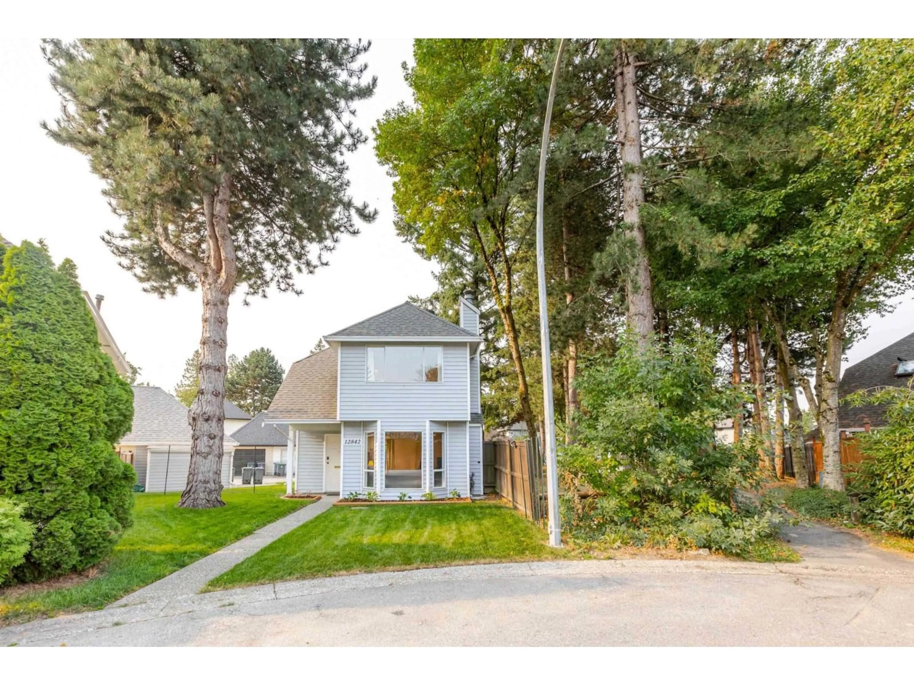 A pic from outside/outdoor area/front of a property/back of a property/a pic from drone, street for 12842 72B AVENUE, Surrey British Columbia V3W9B9