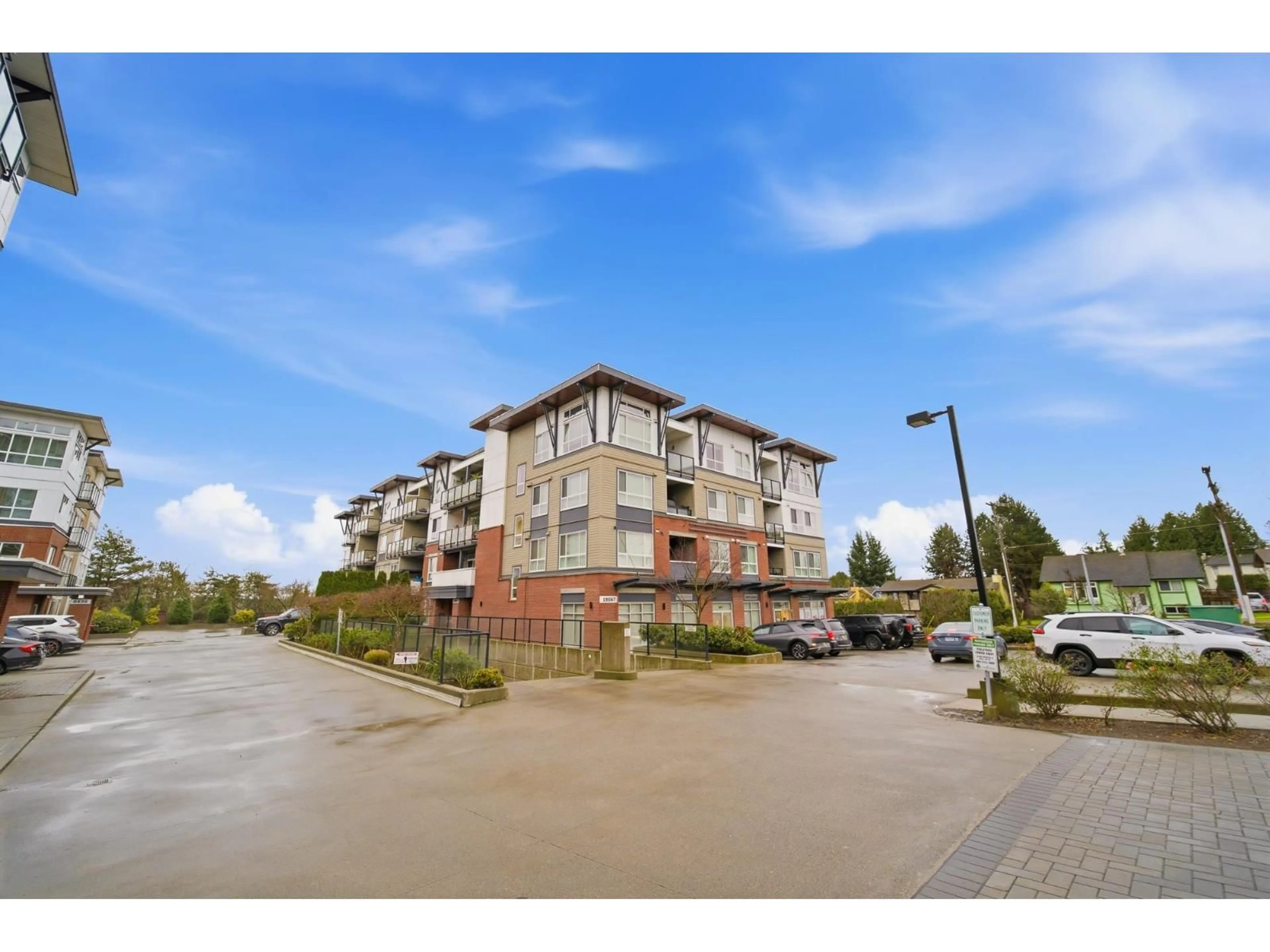 A pic from outside/outdoor area/front of a property/back of a property/a pic from drone, unknown for 309 - 19567 64 AVENUE, Surrey British Columbia V3S7H8