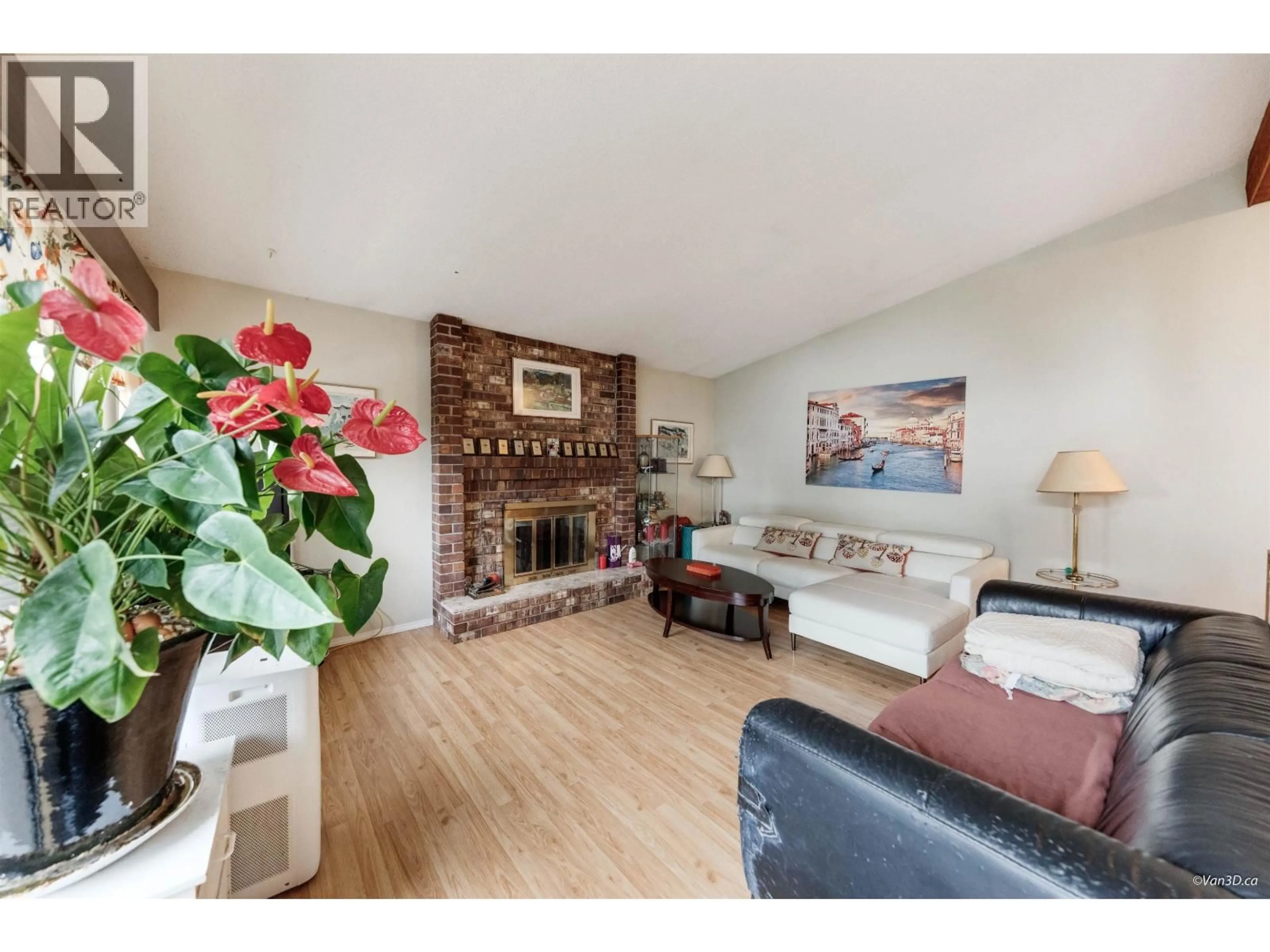 Living room with furniture, wood/laminate floor for 8167 10TH AVENUE, Burnaby British Columbia V3N2S5