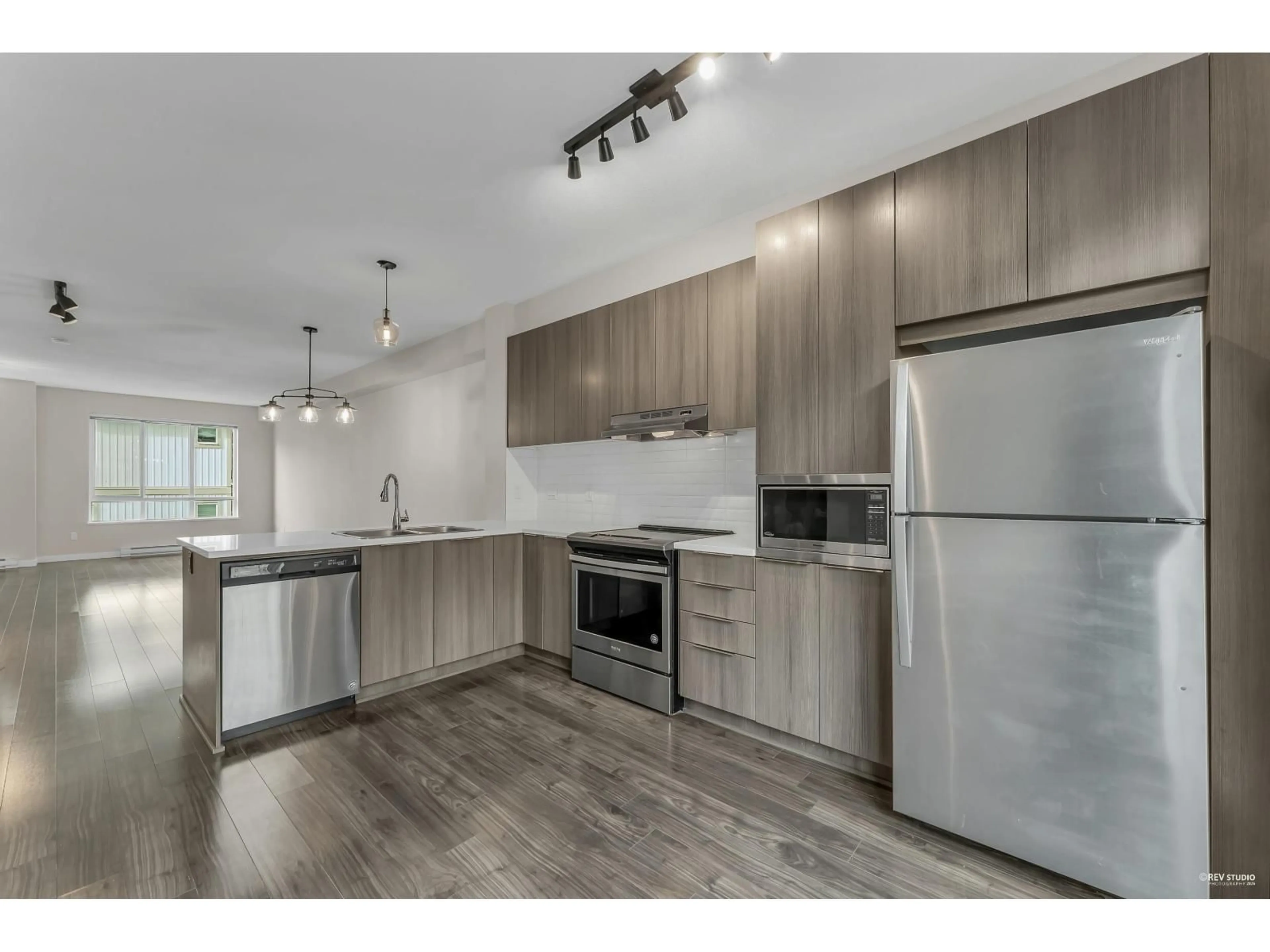 Open concept kitchen, wood/laminate floor for 25 - 30930 WESTRIDGE PLACE, Abbotsford British Columbia V2T0H6