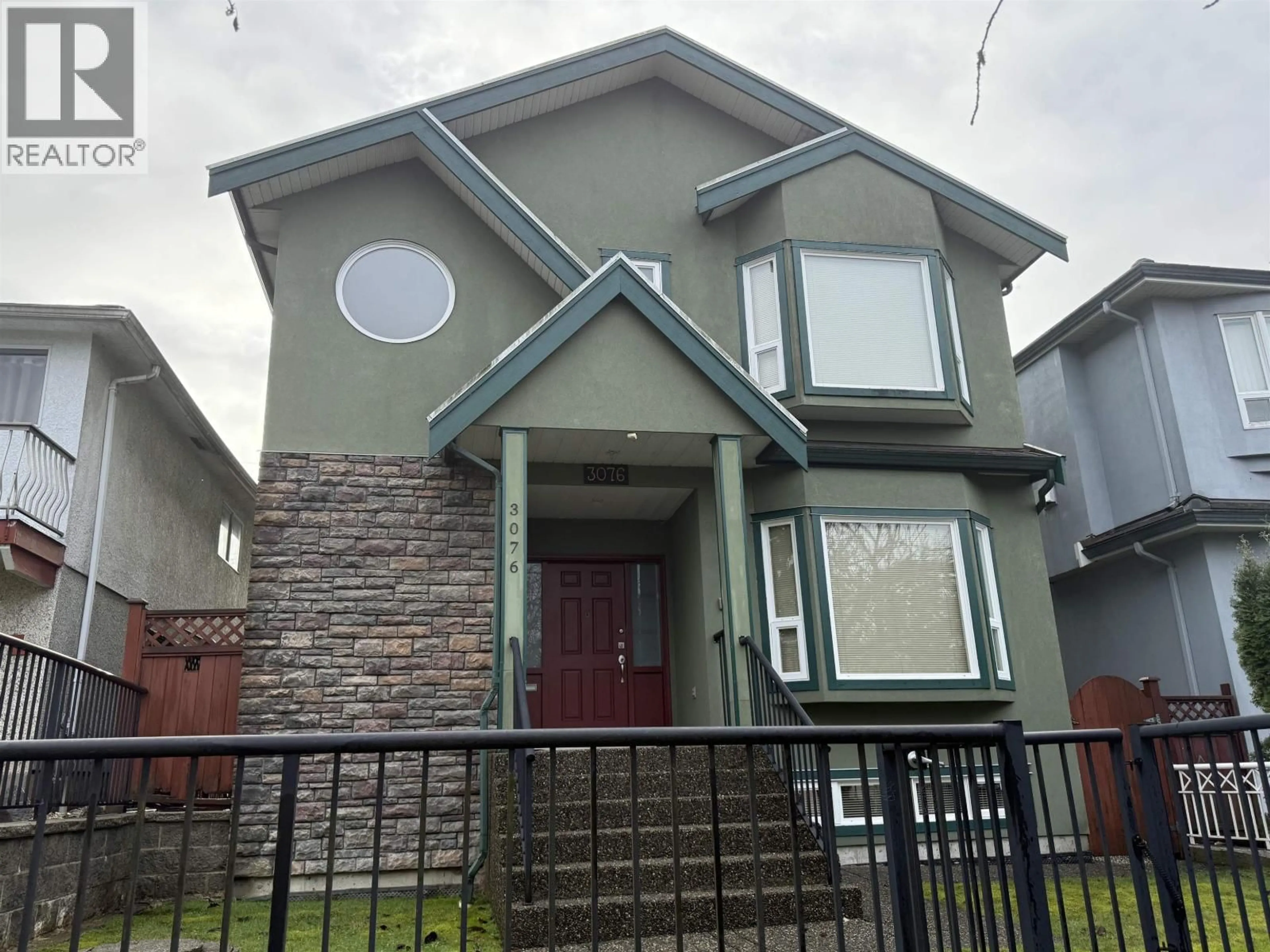 Home with vinyl exterior material, street for 3076 27TH AVENUE, Vancouver British Columbia V5R1P2