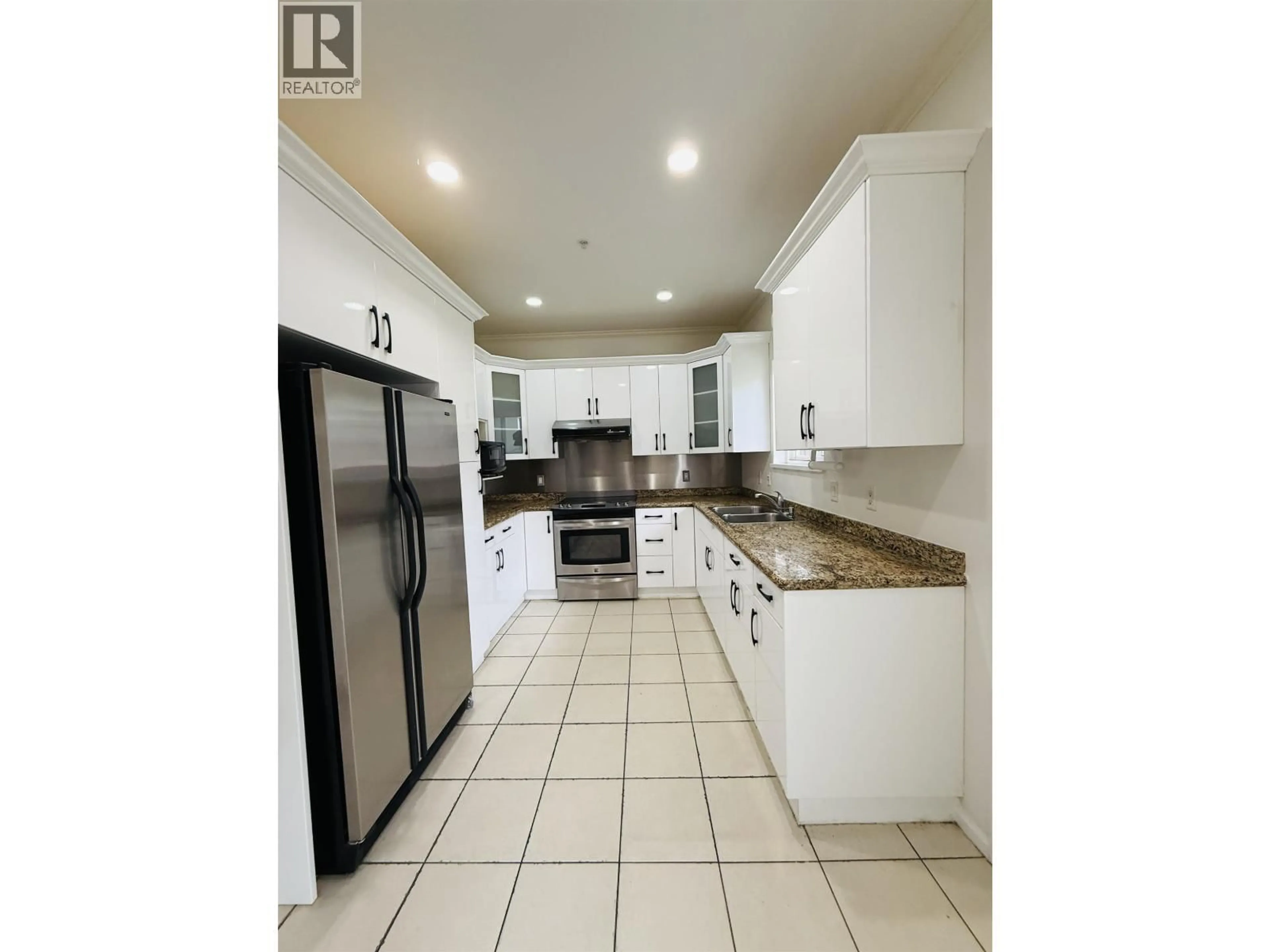 Open concept kitchen, ceramic/tile floor for 3076 27TH AVENUE, Vancouver British Columbia V5R1P2