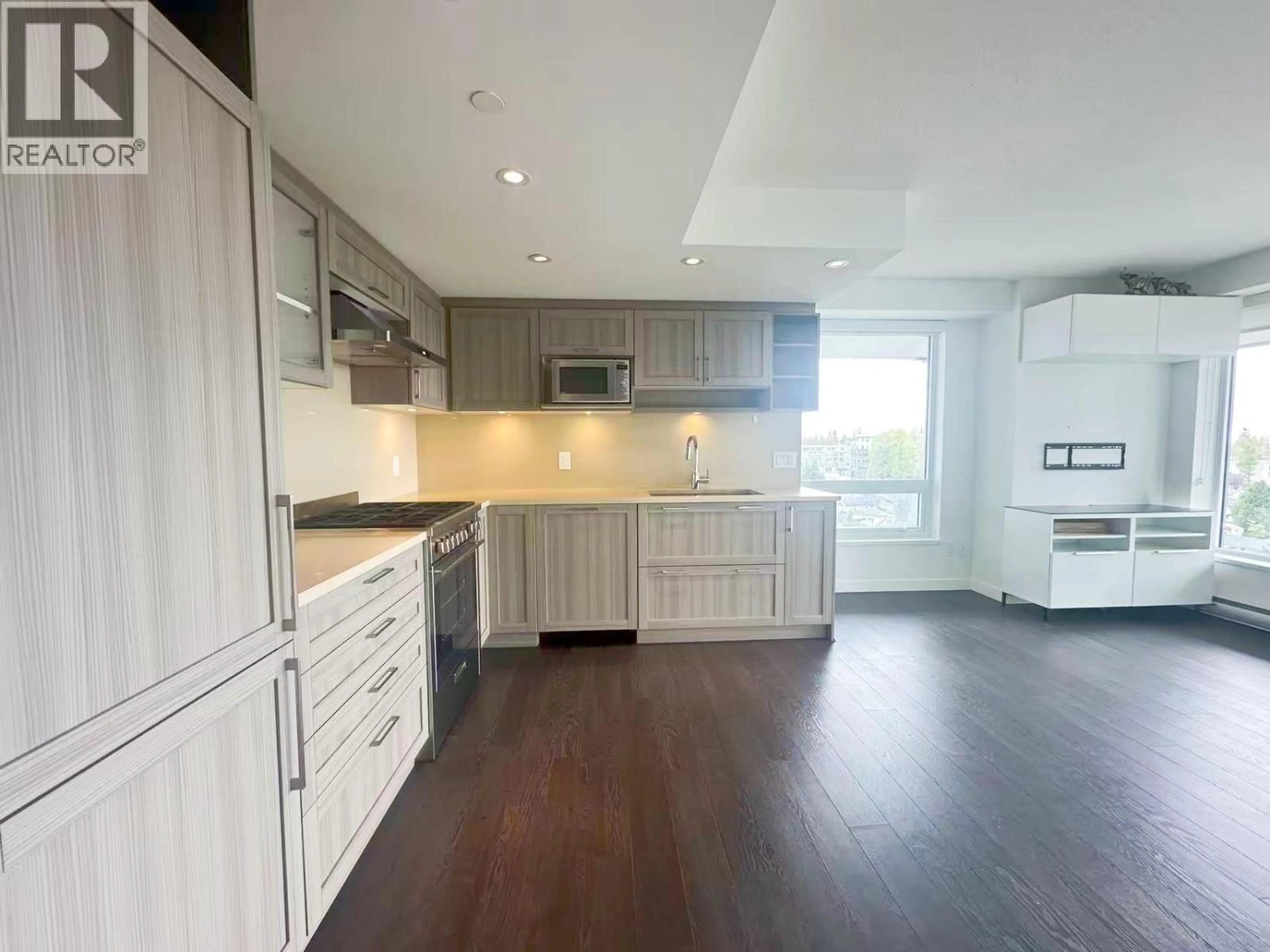 Open concept kitchen, wood/laminate floor for 1502 - 5470 ORMIDALE STREET, Vancouver British Columbia V5R0G6
