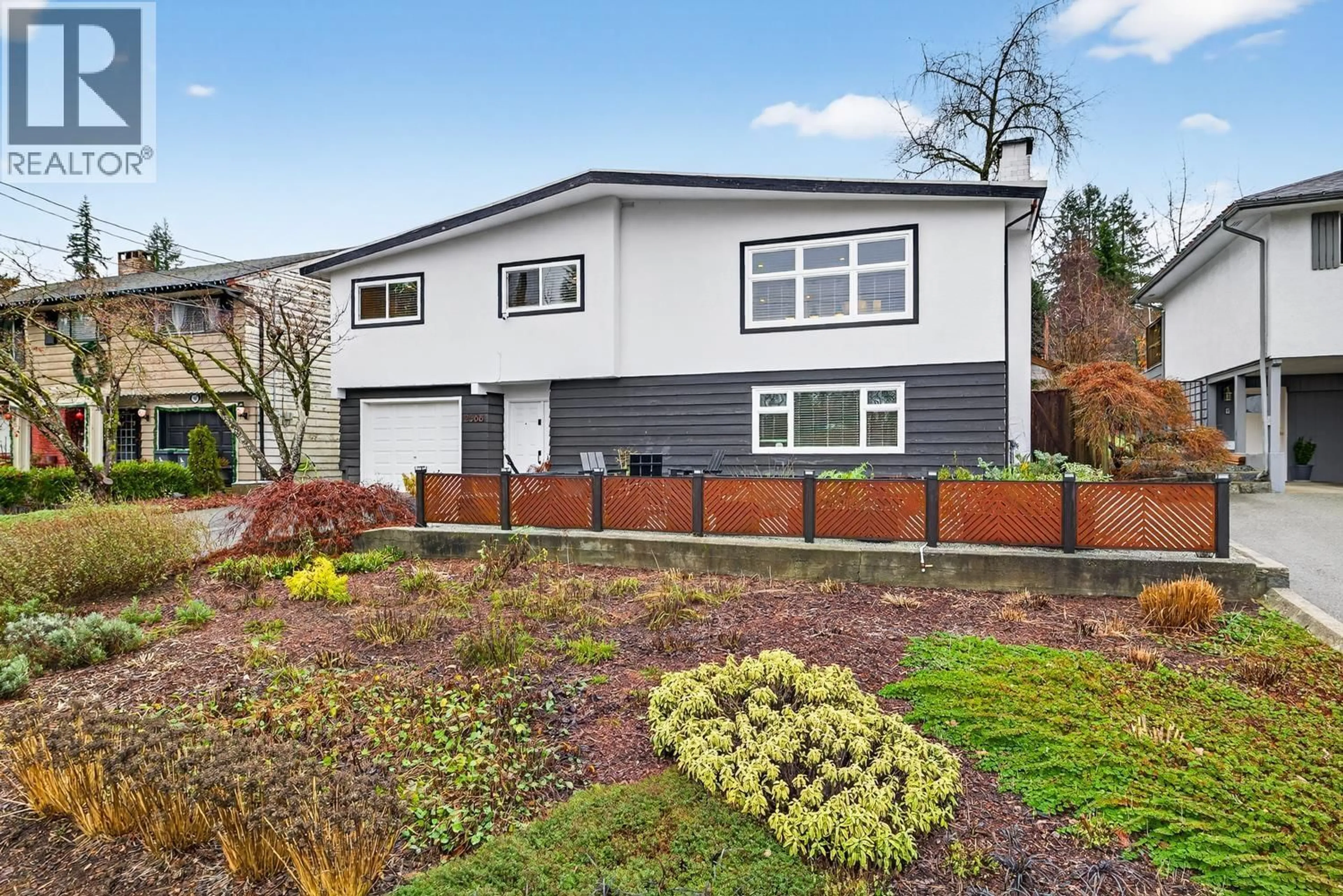 Home with vinyl exterior material, street for 2568 CARNATION STREET, North Vancouver British Columbia V7H1H5