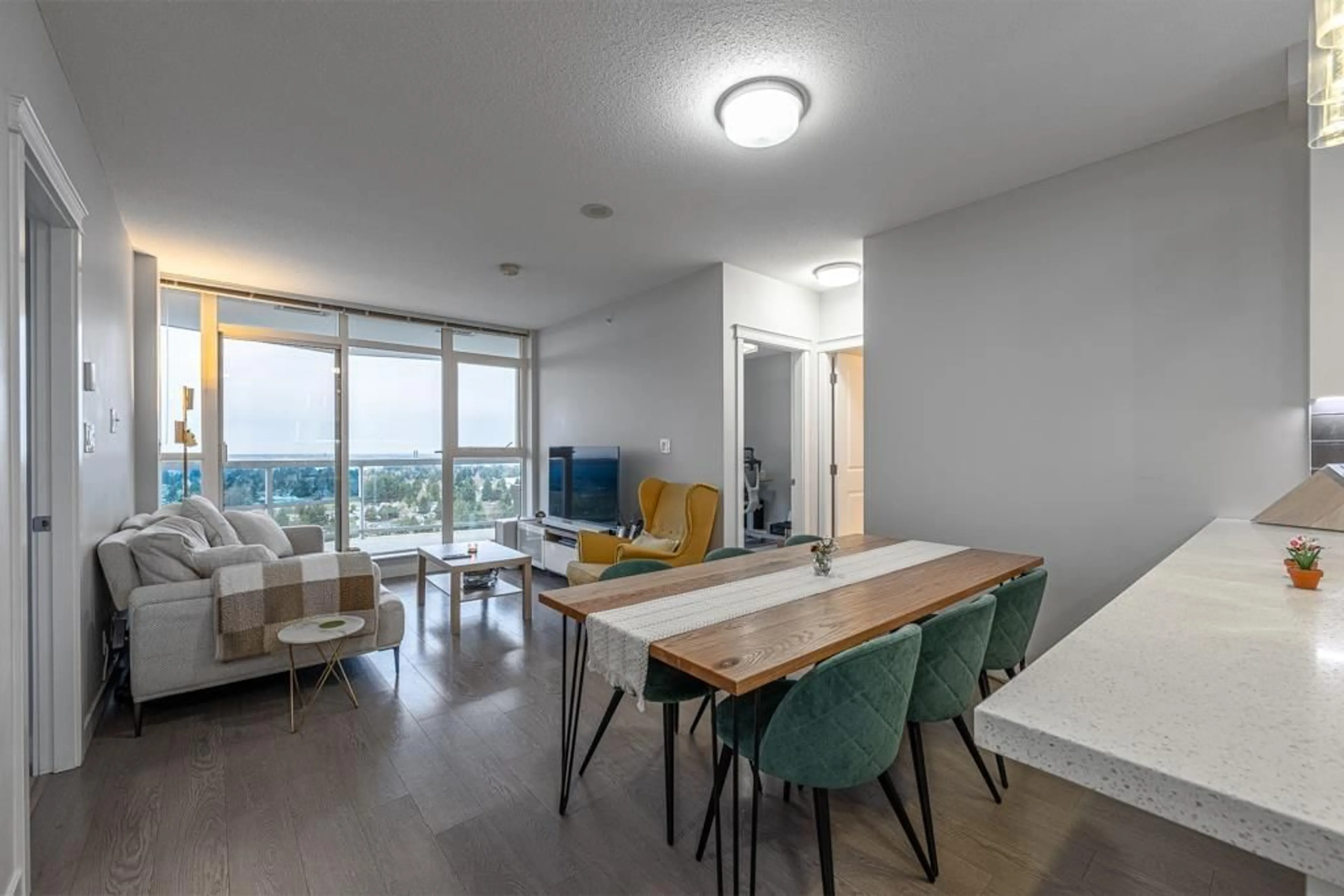 Living room with furniture, wood/laminate floor for 2601 - 11967 80 AVENUE, Delta British Columbia V4C0E2