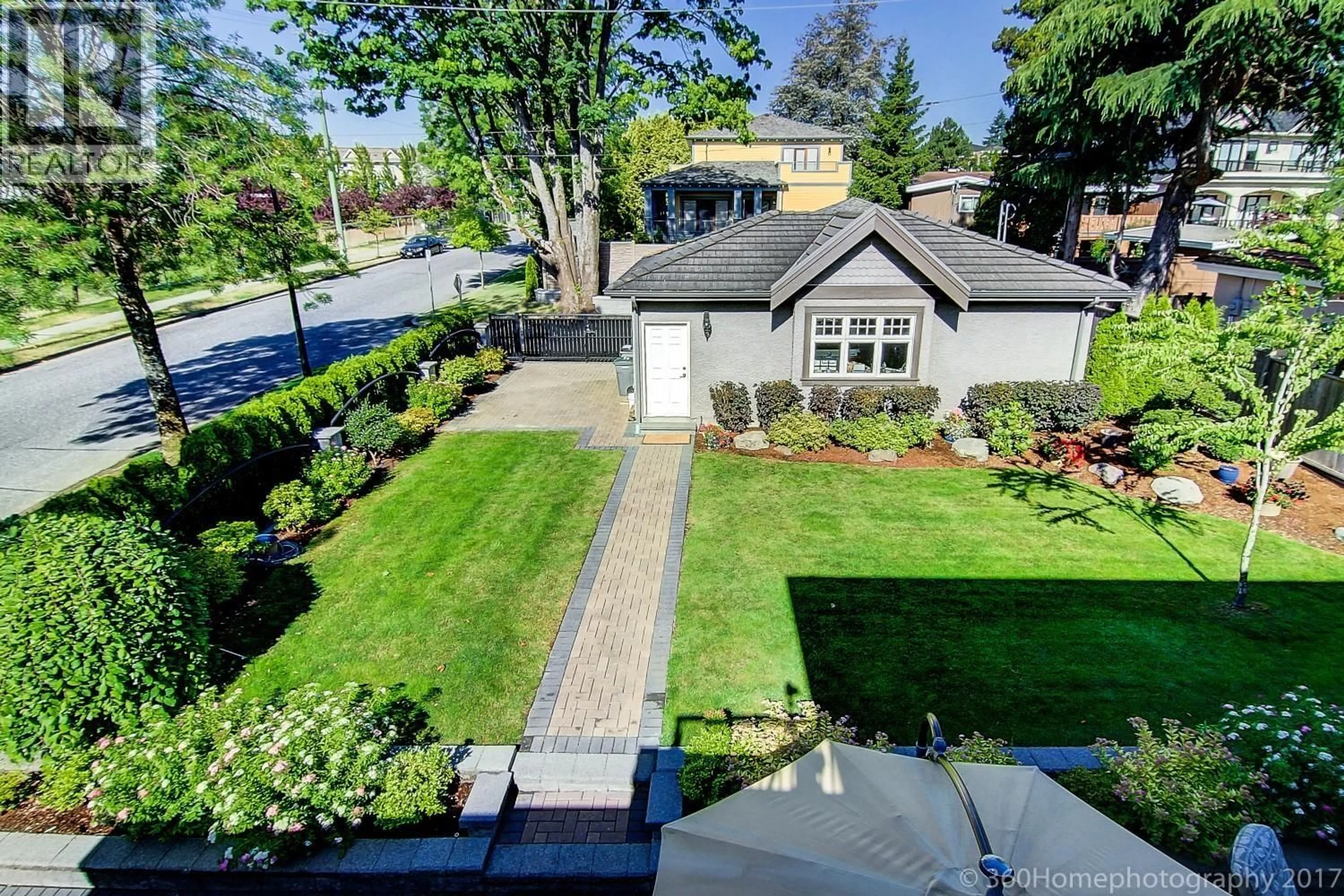 A pic from outside/outdoor area/front of a property/back of a property/a pic from drone, street for 6981 LAUREL STREET, Vancouver British Columbia V6P3T6