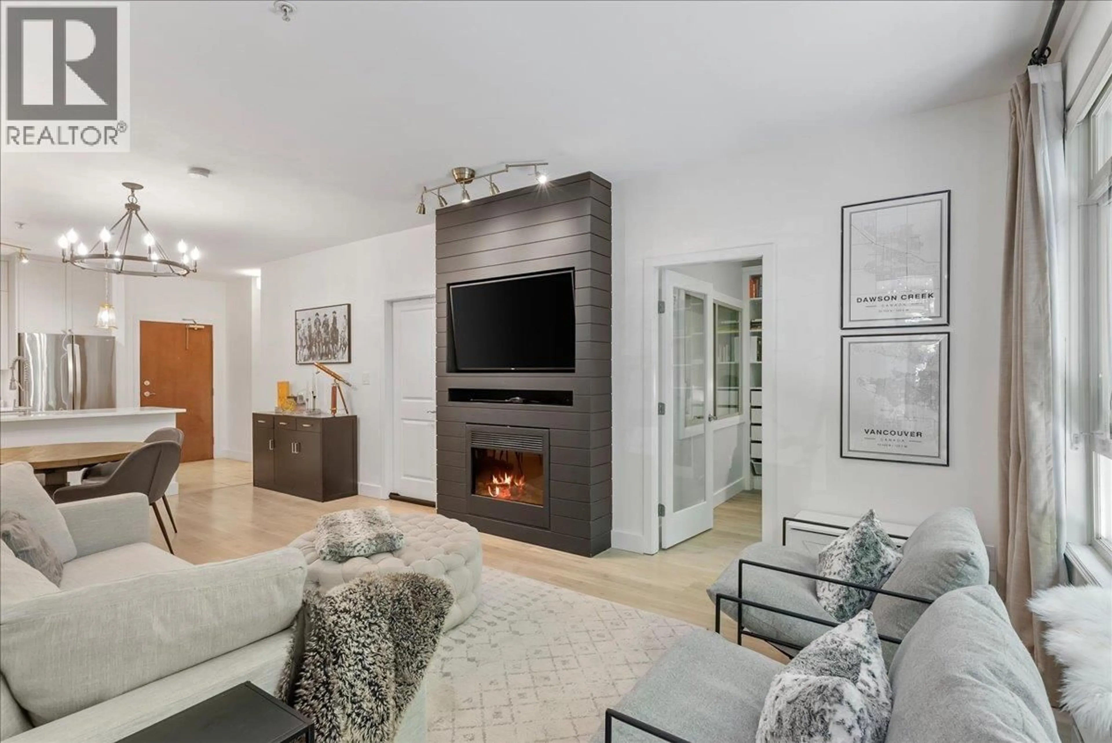 Living room with furniture, unknown for 106 - 200 CAPILANO ROAD, Port Moody British Columbia V3H5N1