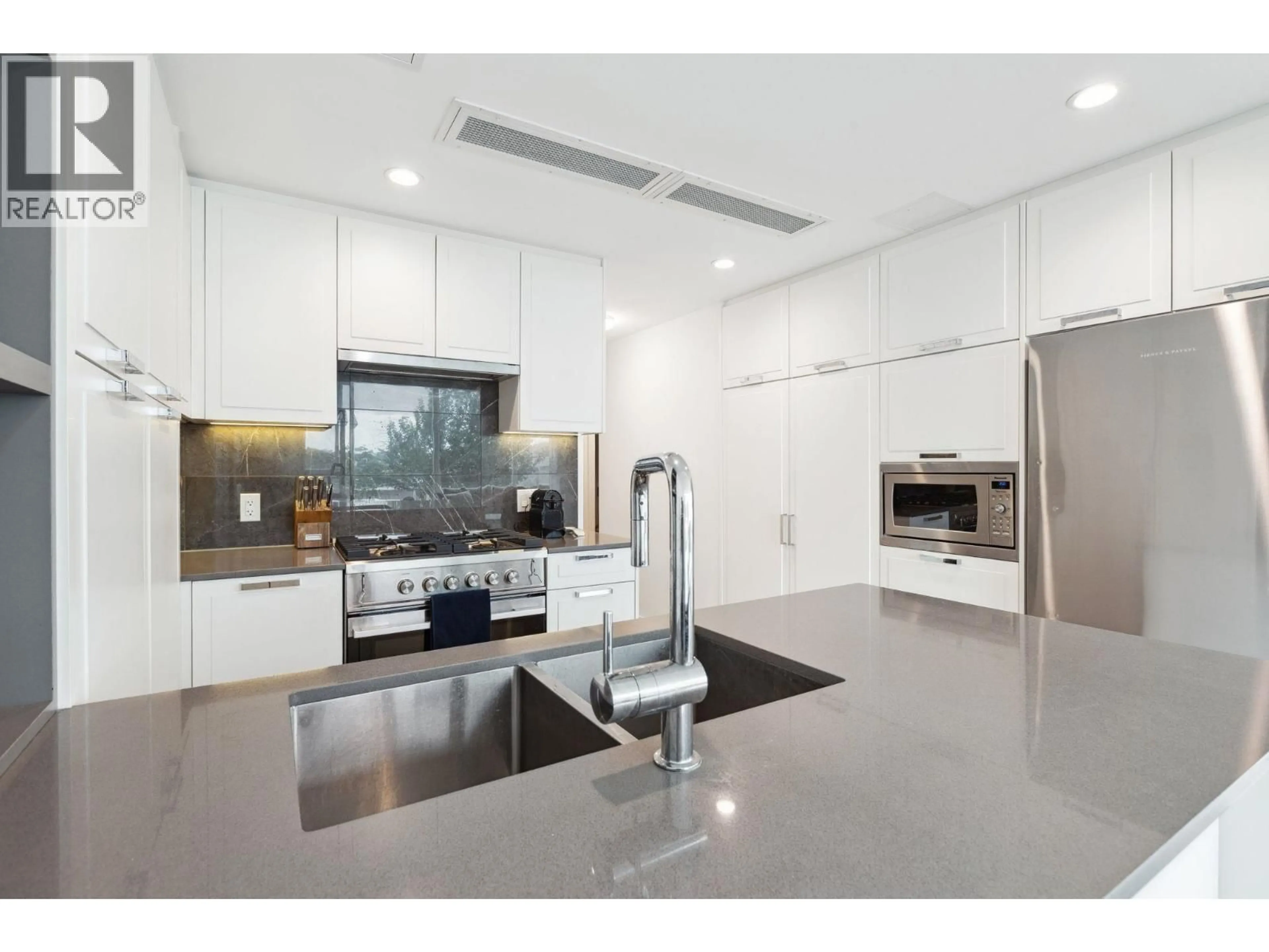 Contemporary kitchen, ceramic/tile floor for 403 - 1471 HUNTER STREET, North Vancouver British Columbia V7J1H3
